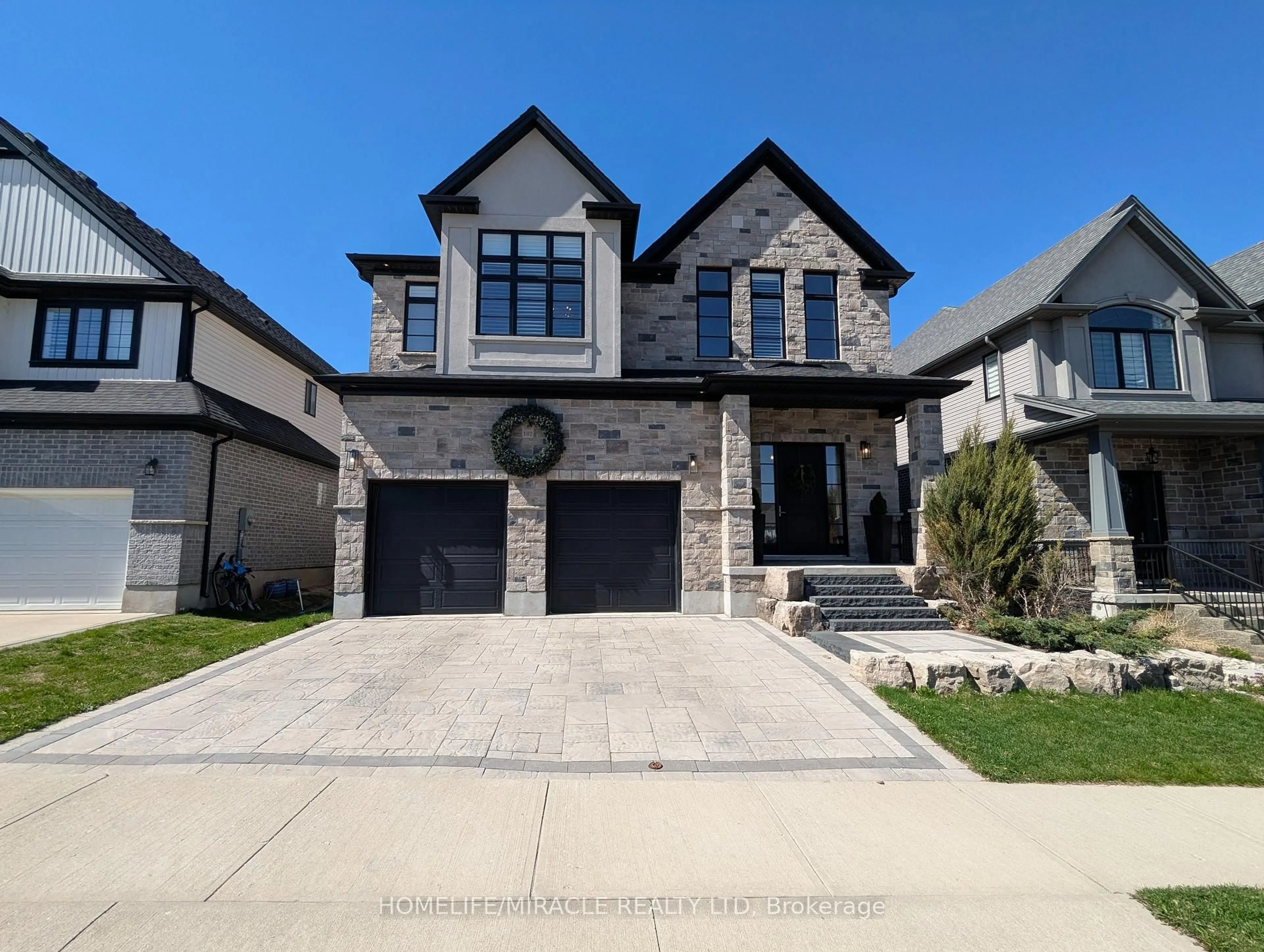 Home with brick exterior material, street for 102 Deer Creek St, Kitchener Ontario N2A 4B8