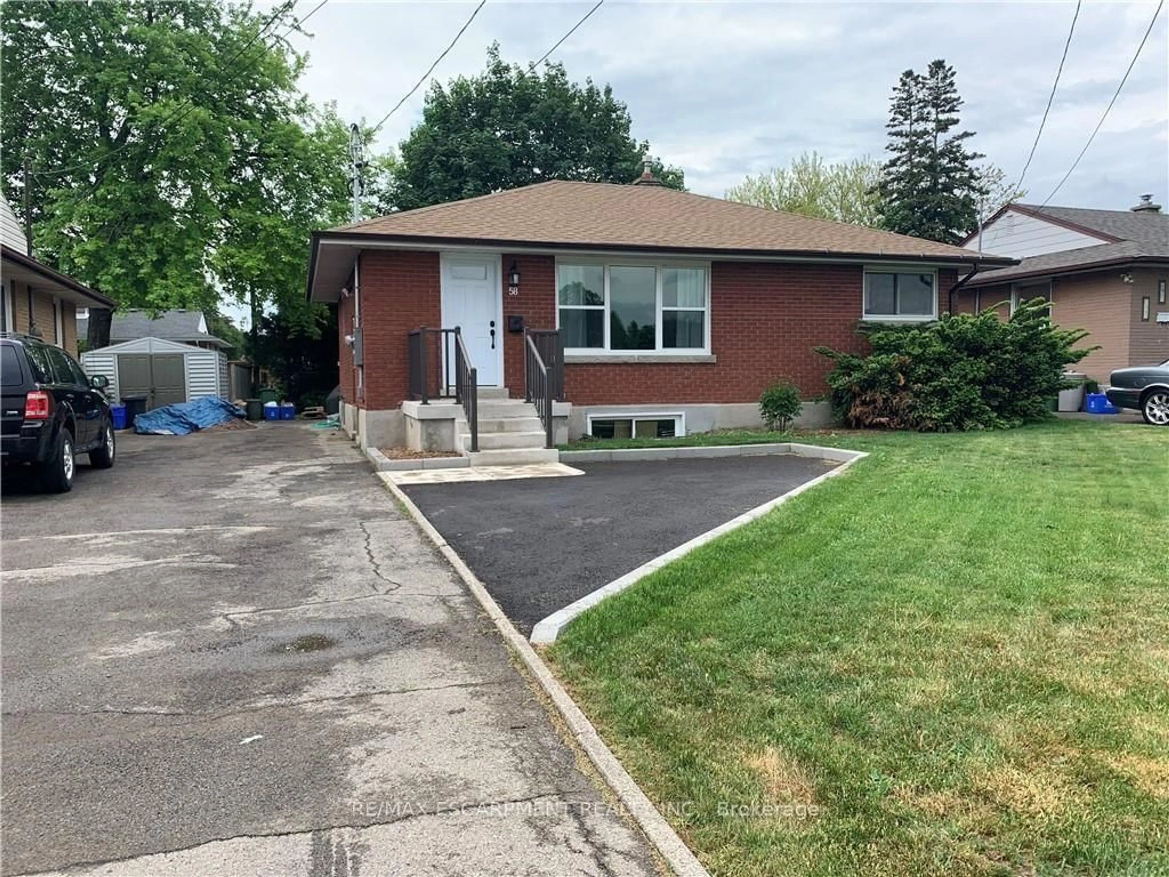 Home with brick exterior material, street for 58 Sandalwood Ave, Hamilton Ontario L8T 2E3