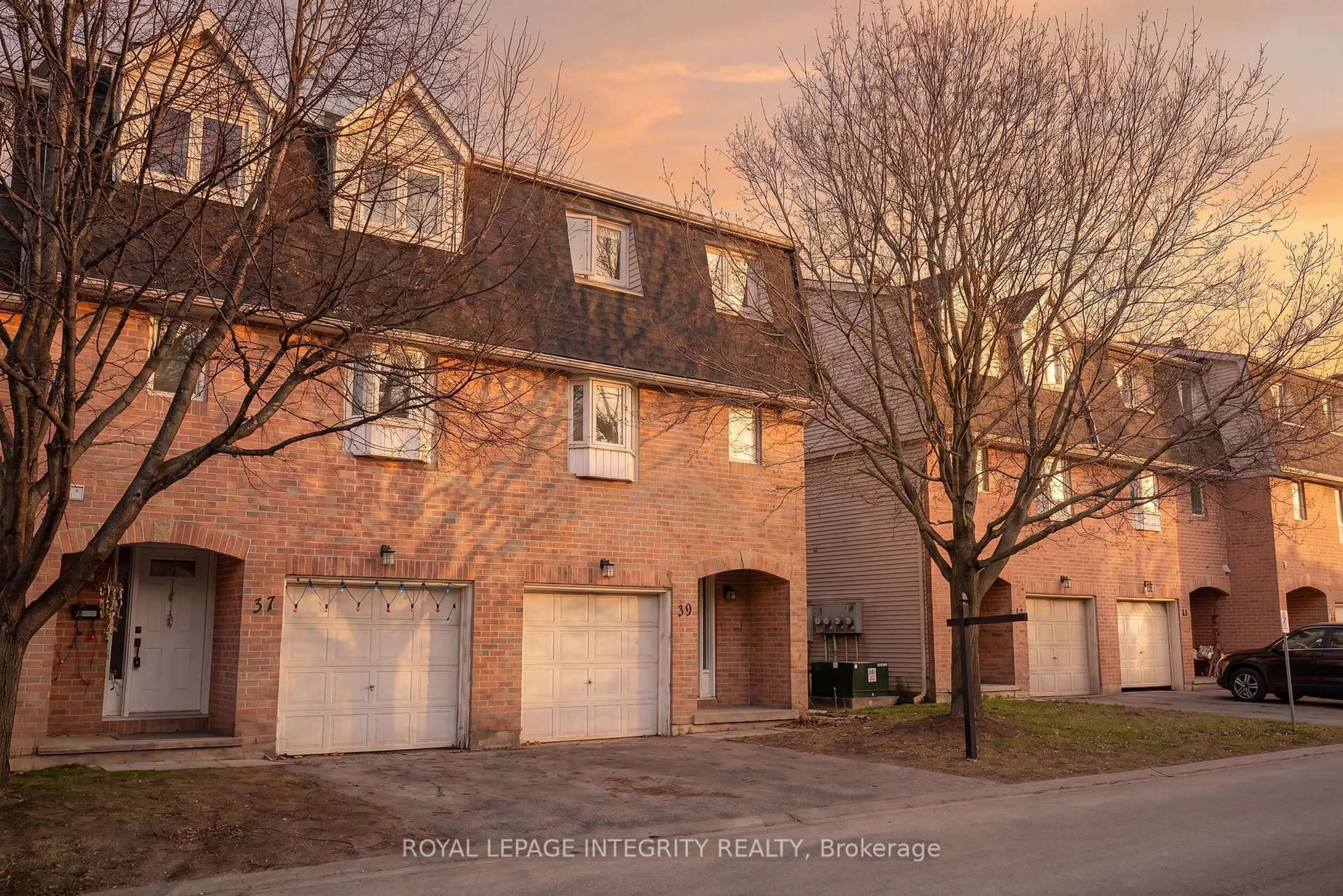 Home with brick exterior material, street for 39 Lightfoot Pl, Ottawa Ontario K2L 3M6
