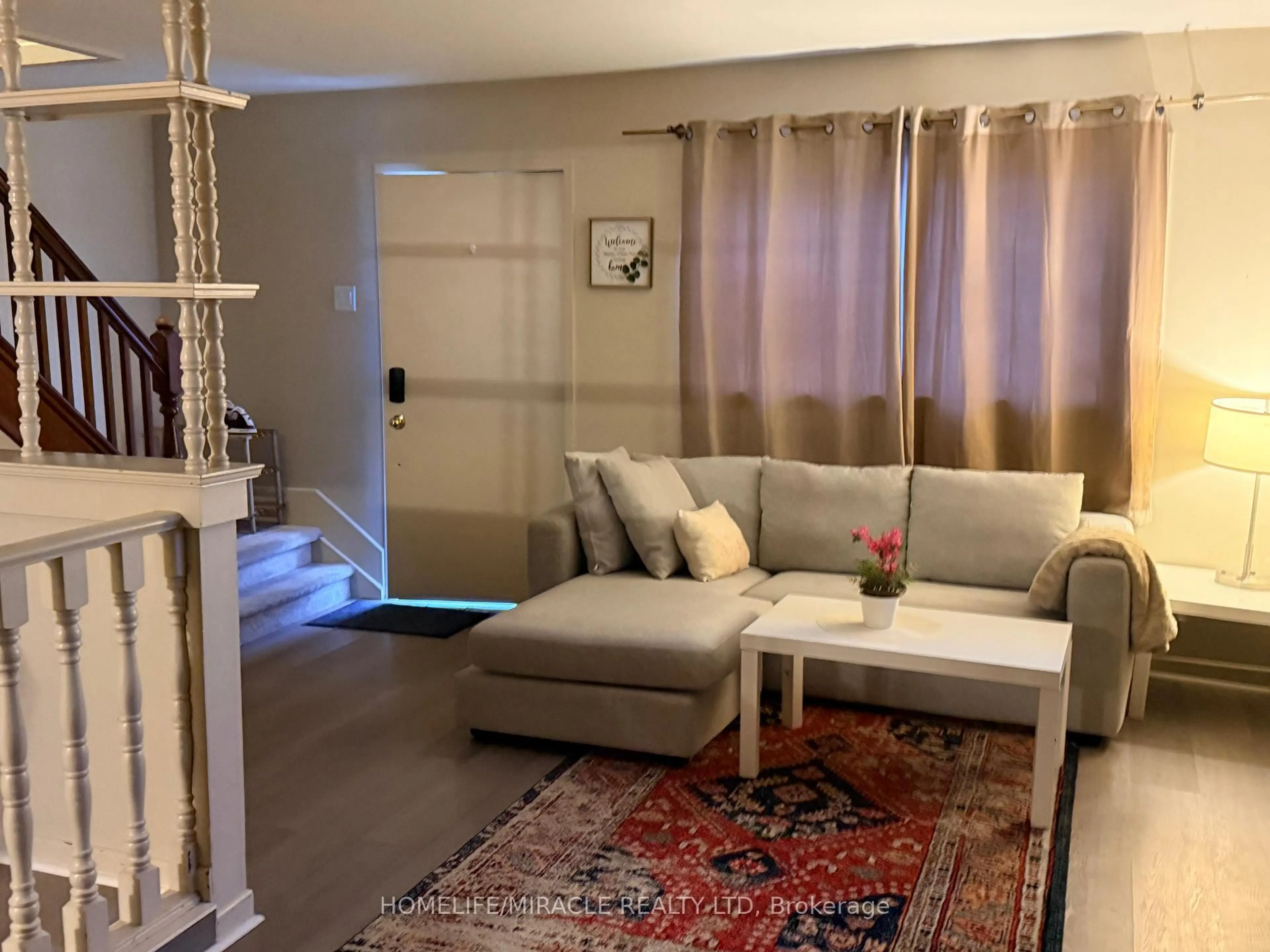 Living room with furniture, carpet floor for 217 Creek St, Chatham-Kent Ontario N8A 4C1