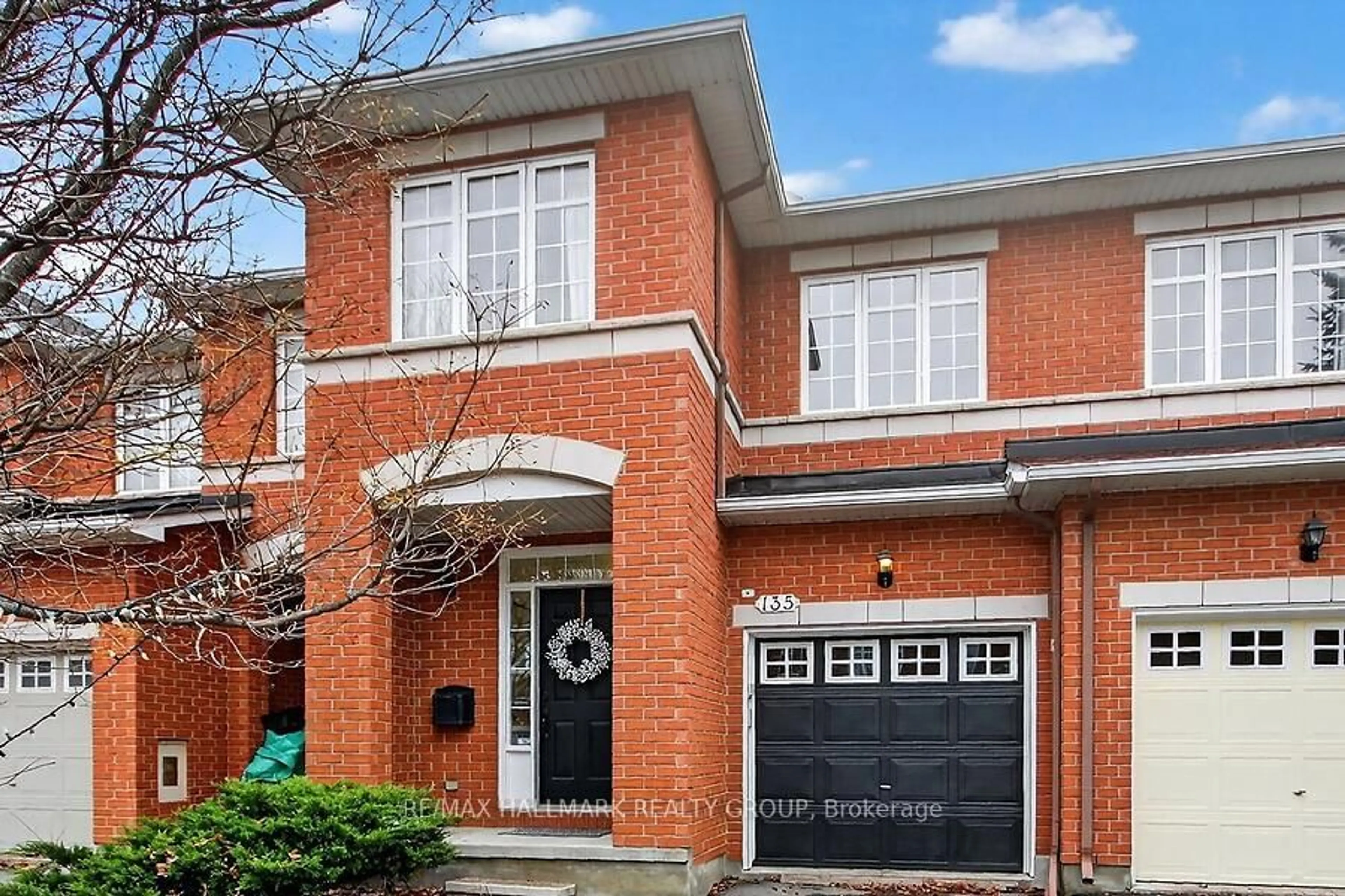 Home with brick exterior material, street for 135 Gatespark Private, Ottawa Ontario K2T 1L1