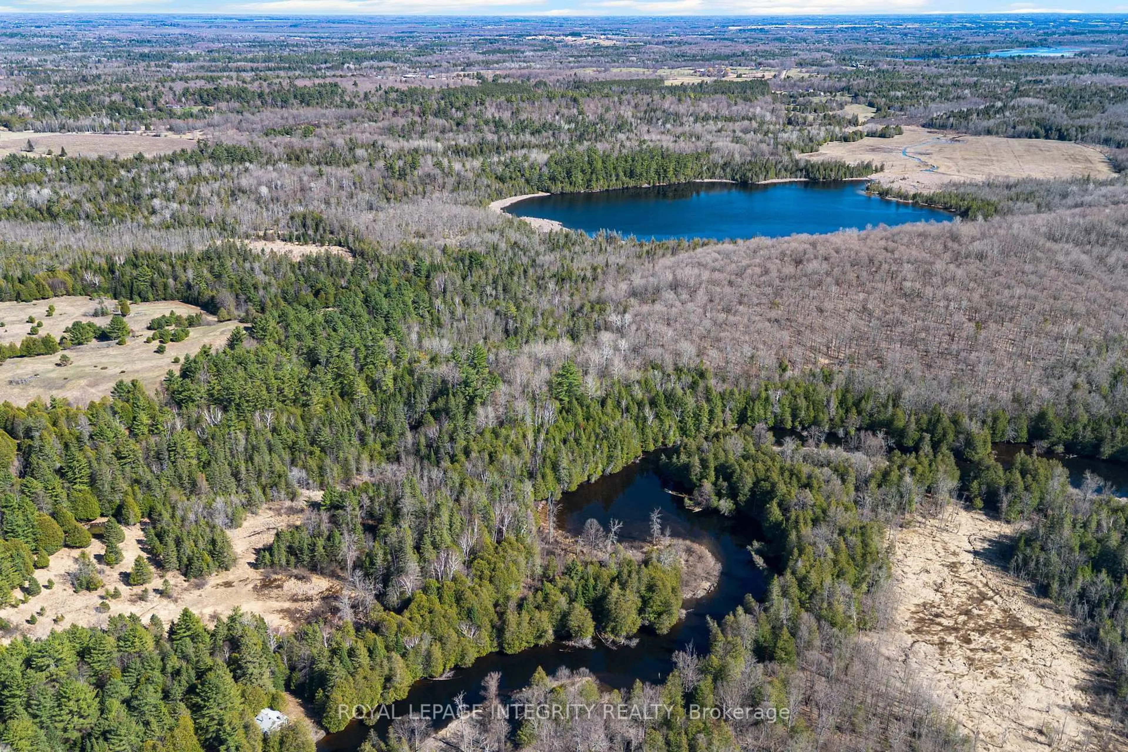A pic from outside/outdoor area/front of a property/back of a property/a pic from drone, water/lake/river/ocean view for 154 Proulx Lane, Lanark Ontario K0G 1K0