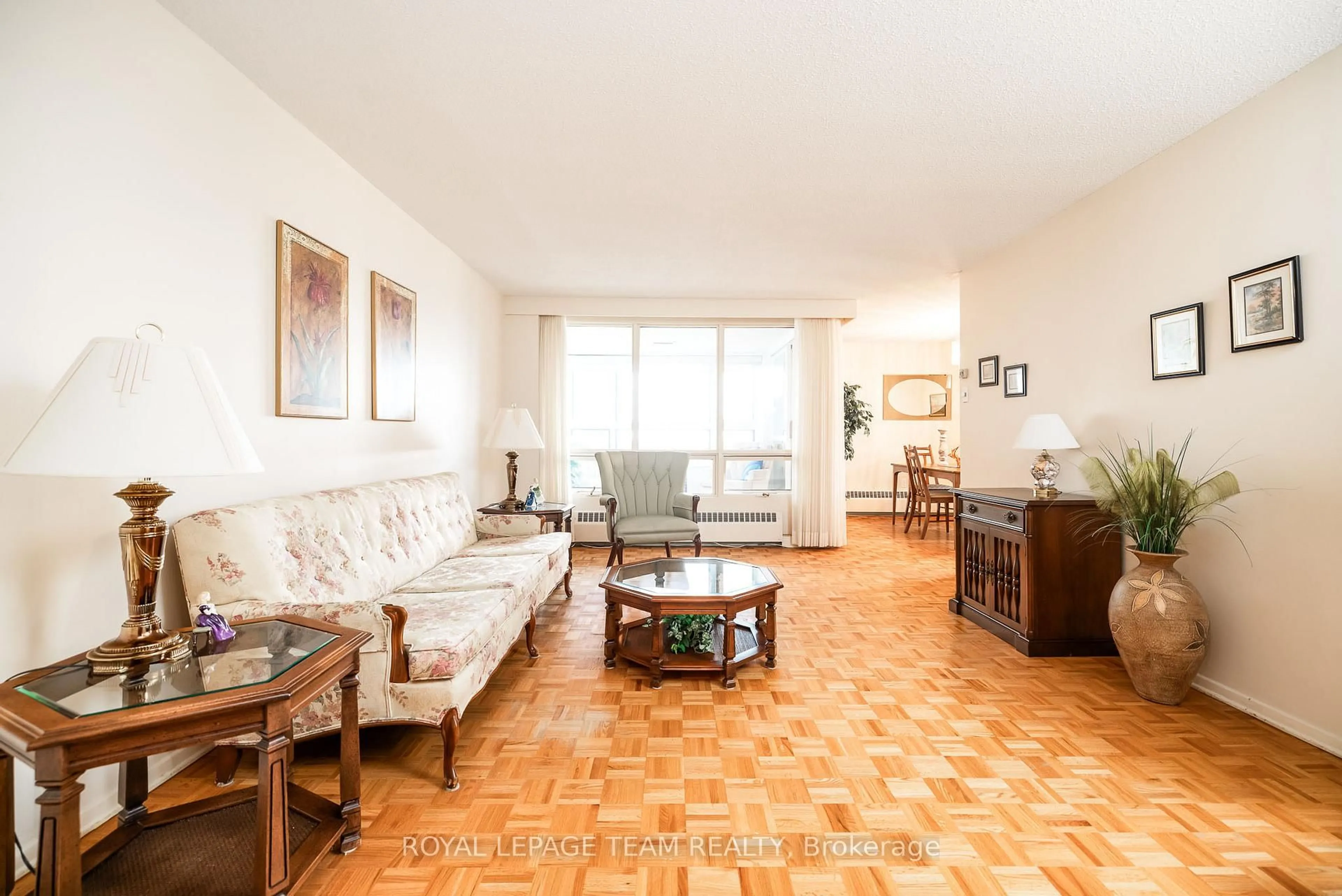 Living room with furniture, unknown for 1356 Meadowlands Dr #701, Ottawa Ontario K2E 6K6