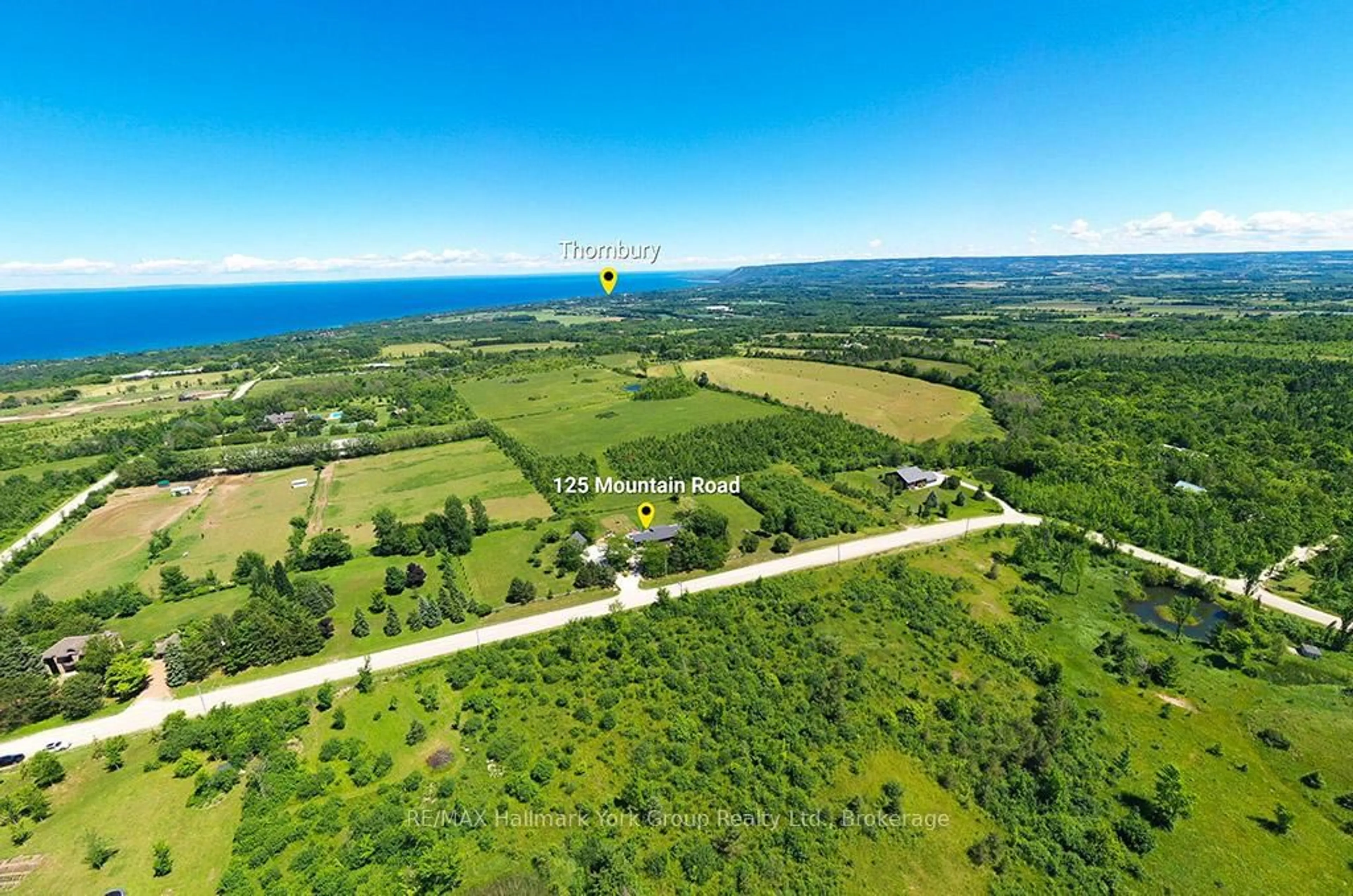 A pic from outside/outdoor area/front of a property/back of a property/a pic from drone, water/lake/river/ocean view for 125 Mountain Rd, Meaford Ontario N4L 1W6
