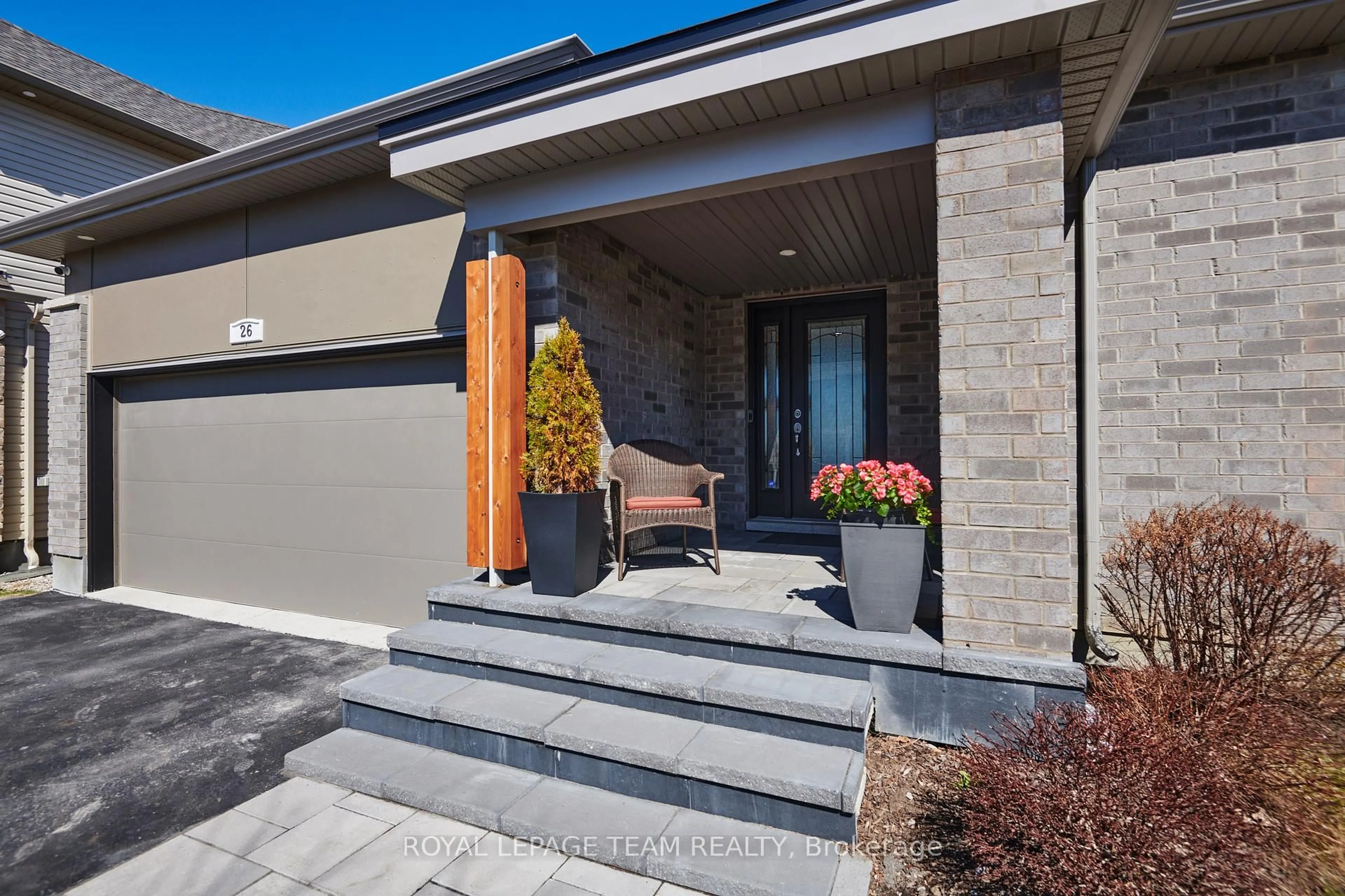 Home with brick exterior material, street for 26 Salamander Way, Ottawa Ontario K1X 0E9