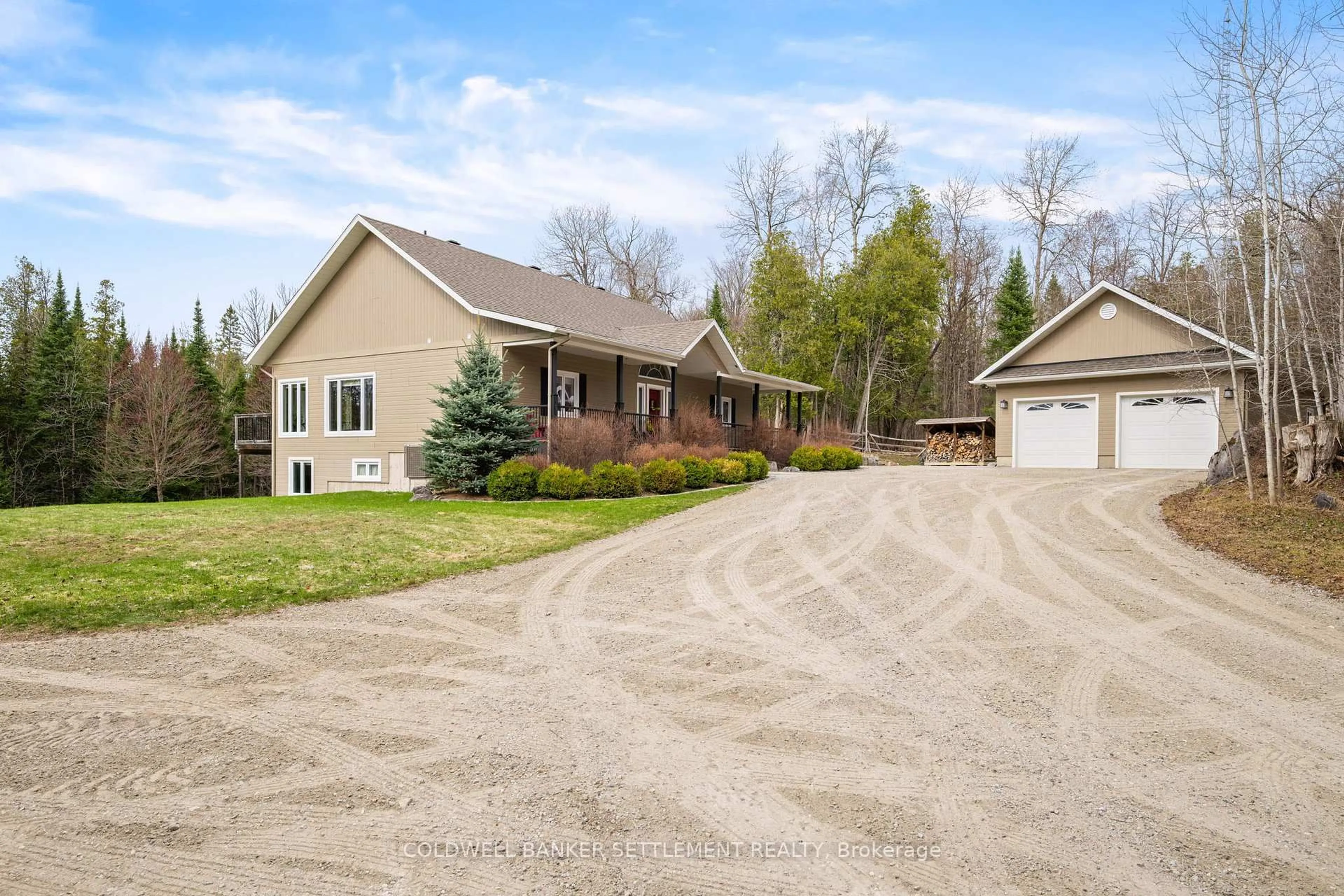A pic from outside/outdoor area/front of a property/back of a property/a pic from drone, street for 3124 McDonald's Corners Road Rd, Lanark Ontario K0G 1K0