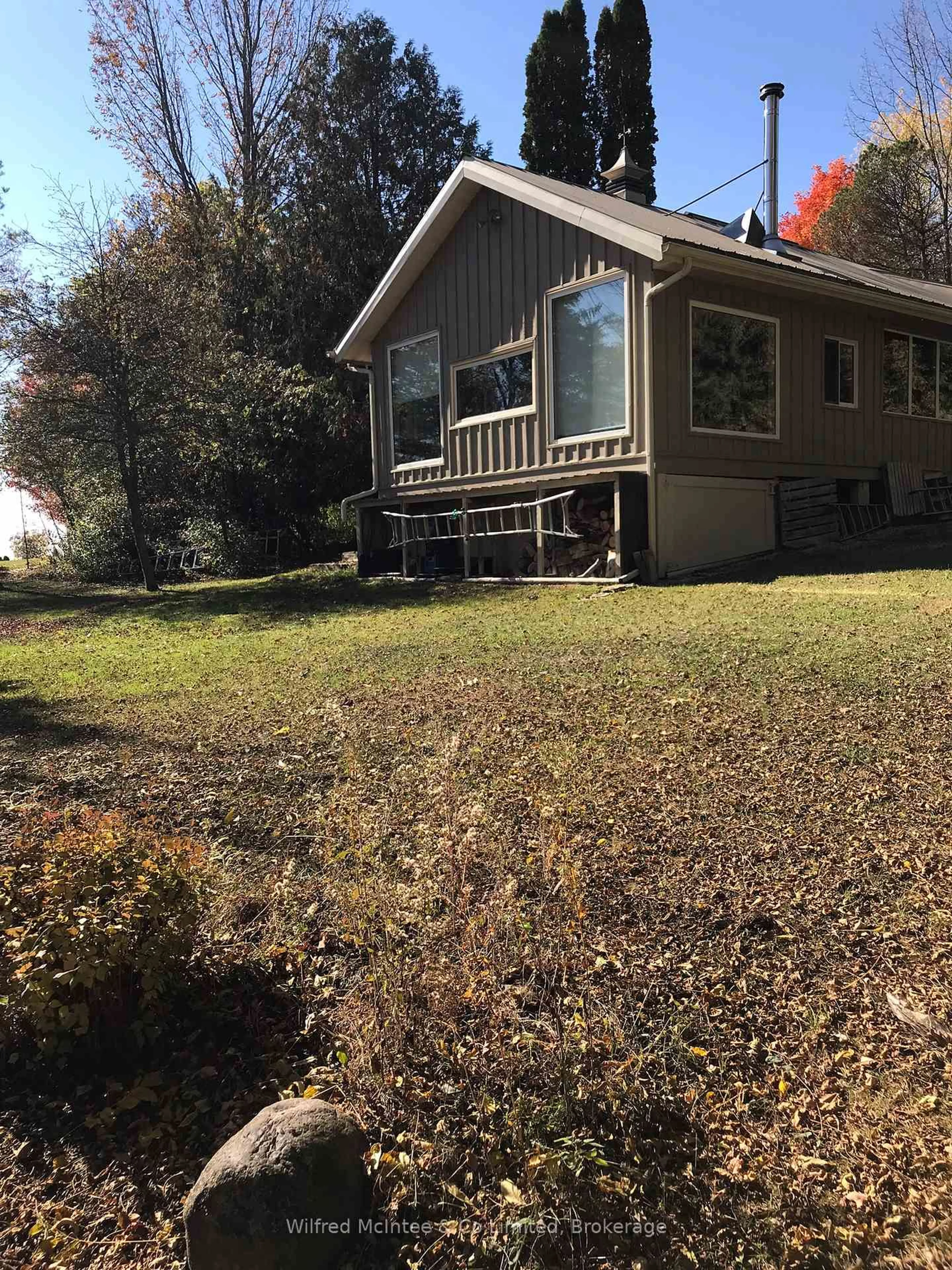 A pic from outside/outdoor area/front of a property/back of a property/a pic from drone, unknown for 302299 Concession Rd 2 SDR, West Grey Ontario N4N 3B8