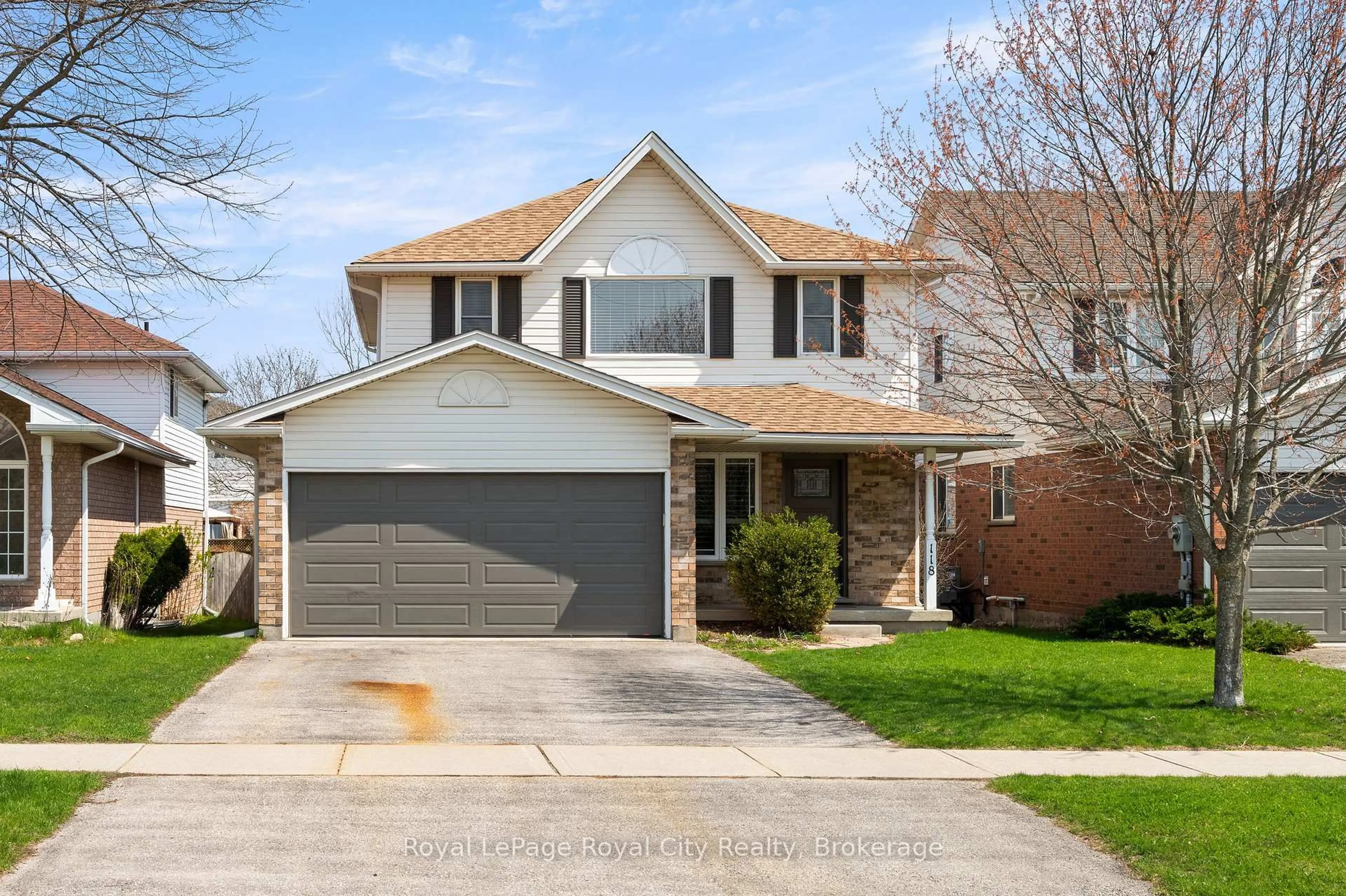 Home with brick exterior material, street for 118 Clairfields Dr, Guelph Ontario N1G 5A5