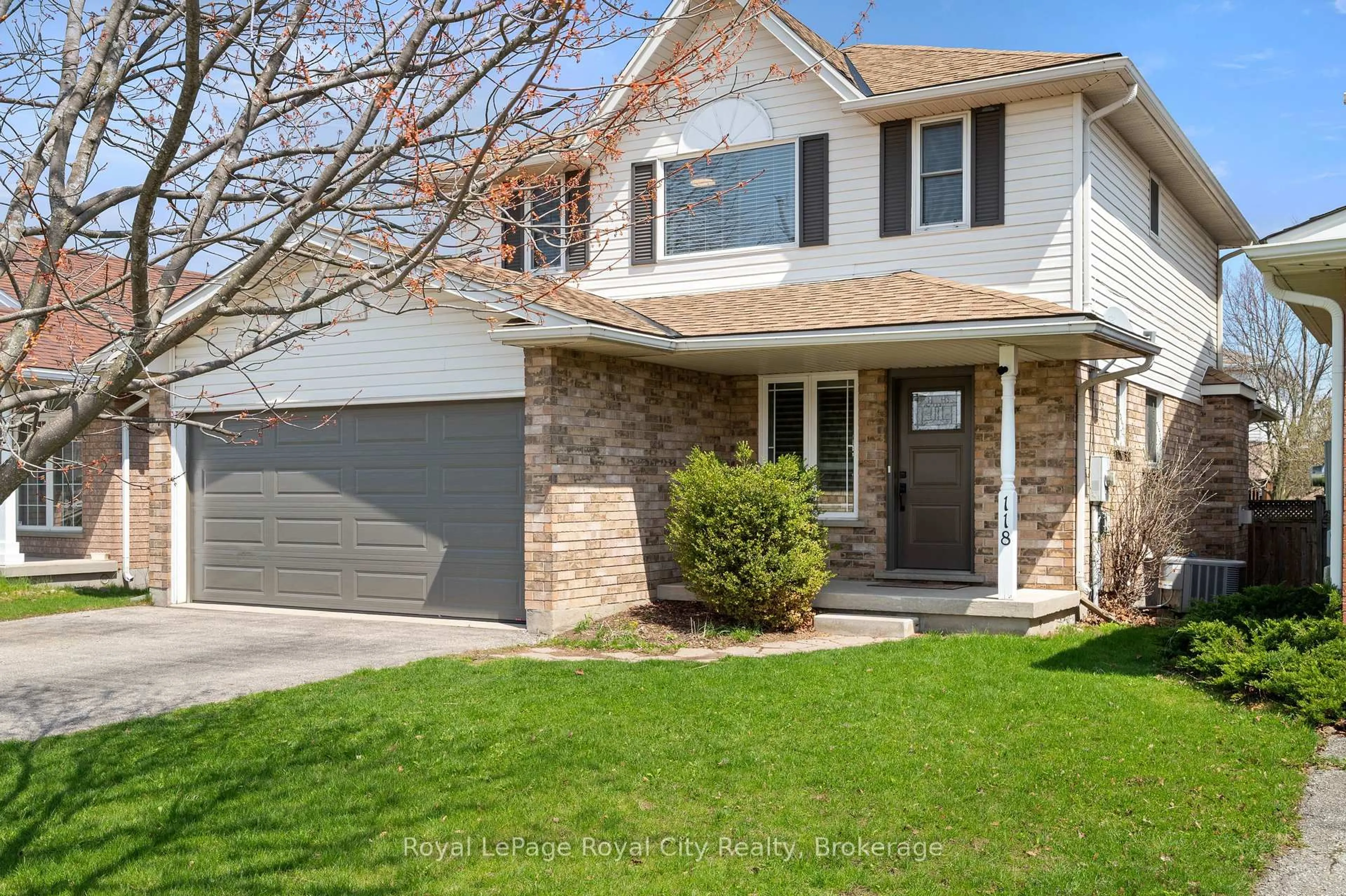 Home with vinyl exterior material, street for 118 Clairfields Dr, Guelph Ontario N1G 5A5