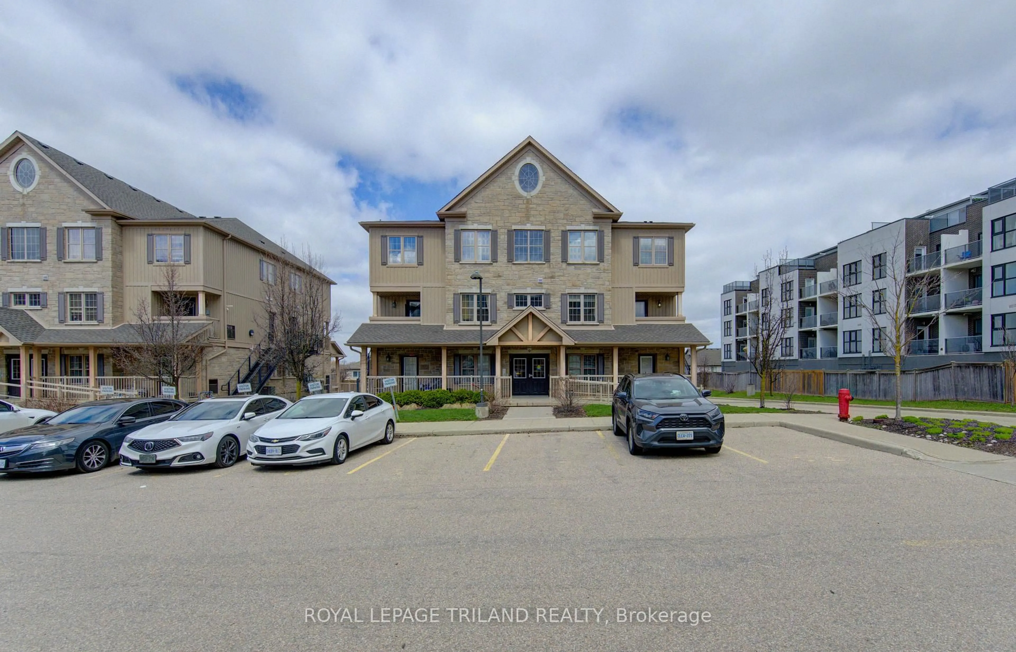 A pic from outside/outdoor area/front of a property/back of a property/a pic from drone, unknown for 1460 Highland Rd #9H, Kitchener Ontario N2N 0B7