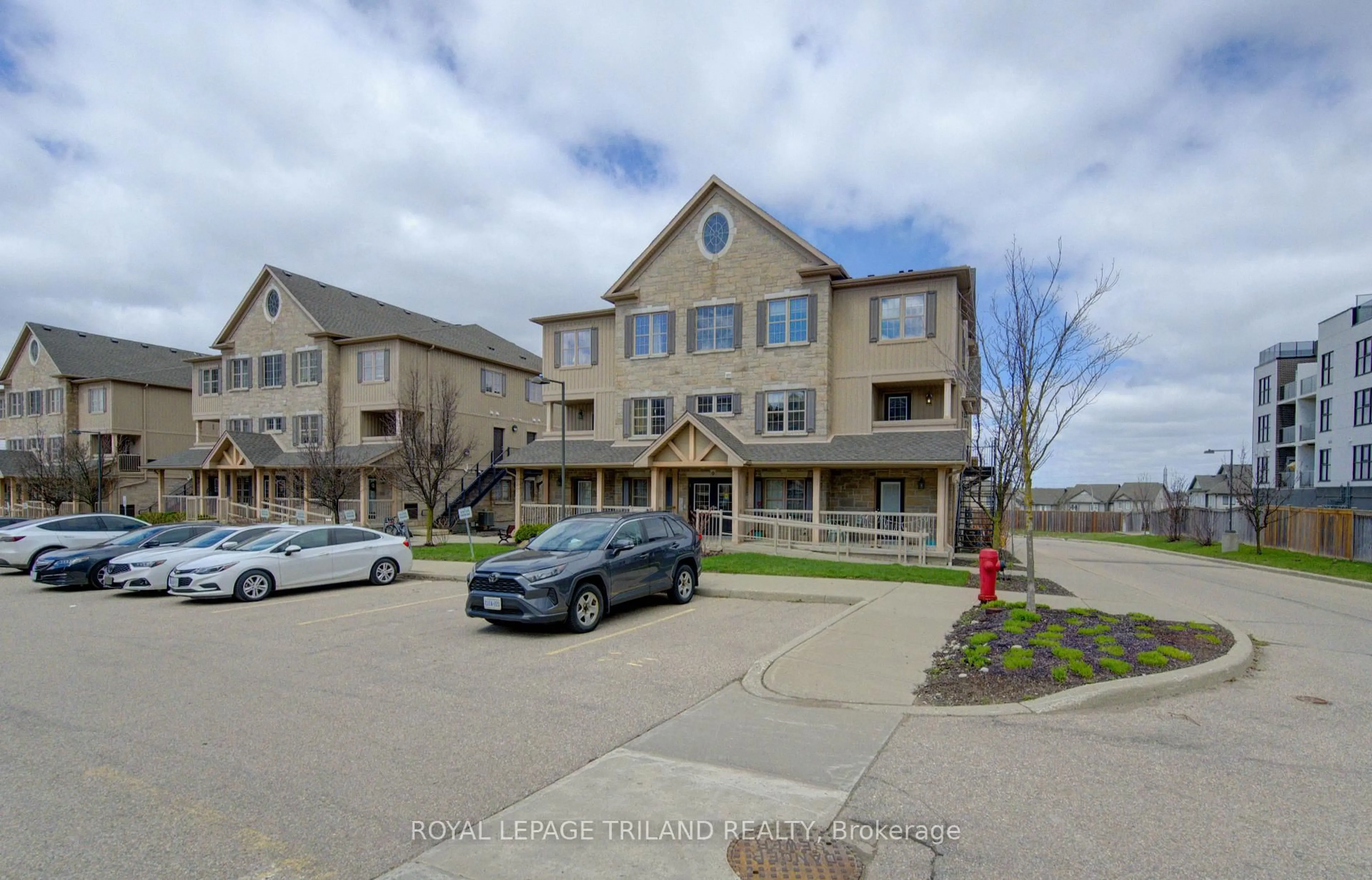 A pic from outside/outdoor area/front of a property/back of a property/a pic from drone, unknown for 1460 Highland Rd #9H, Kitchener Ontario N2N 0B7