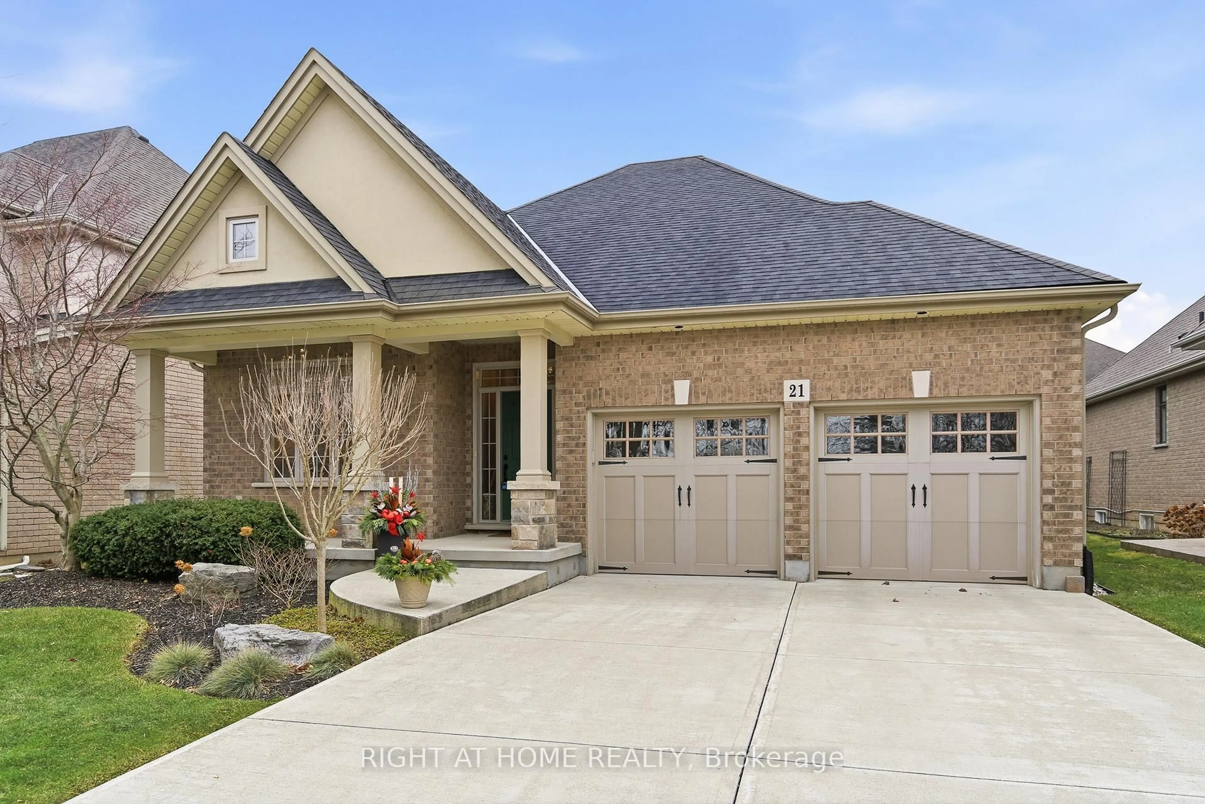 Home with brick exterior material, street for 21 Tulip Tree Rd, Niagara-on-the-Lake Ontario L0S 1J1