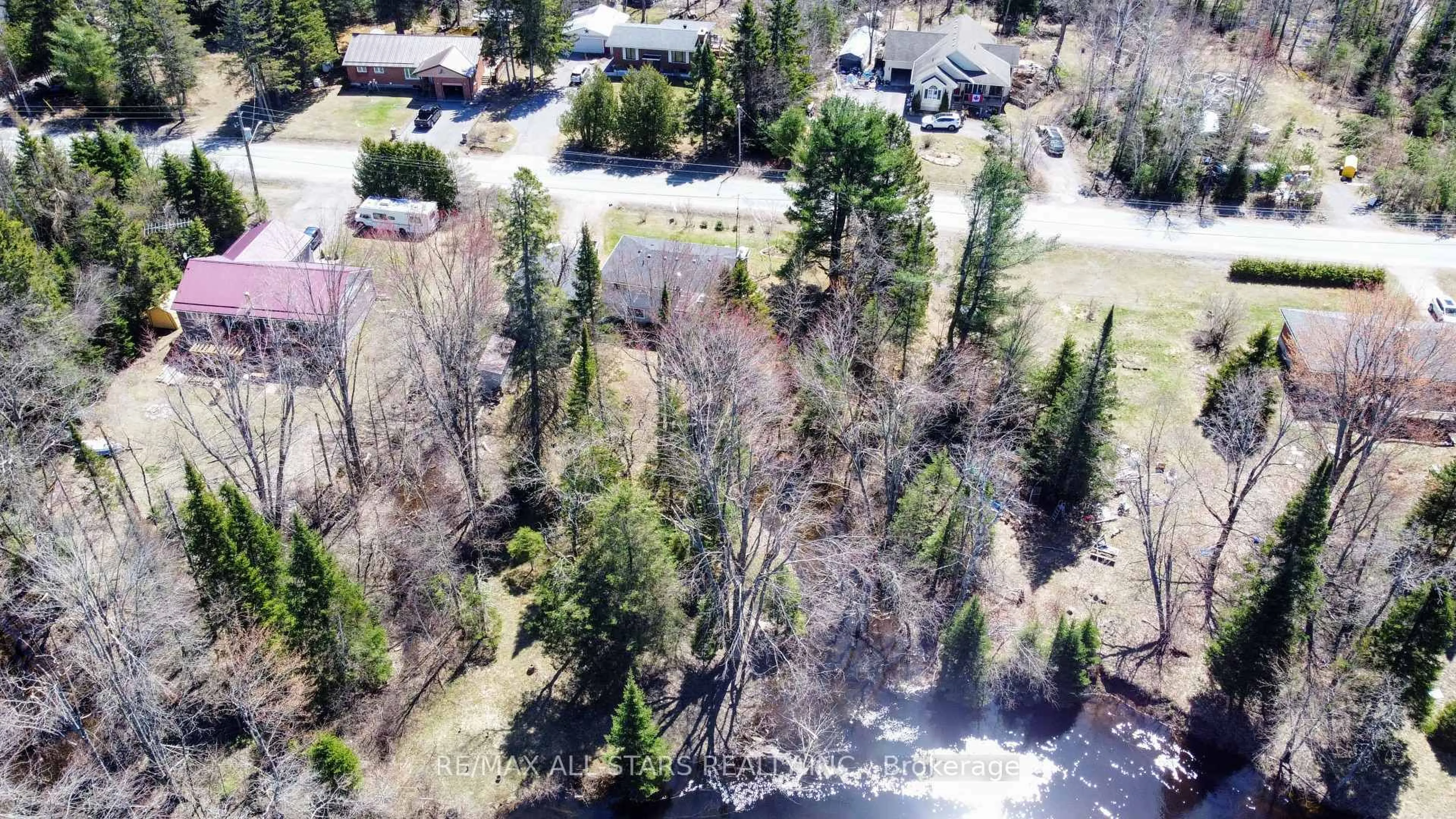 A pic from outside/outdoor area/front of a property/back of a property/a pic from drone, forest/trees view for 161 McFadden Rd, North Kawartha Ontario K0L 1A0
