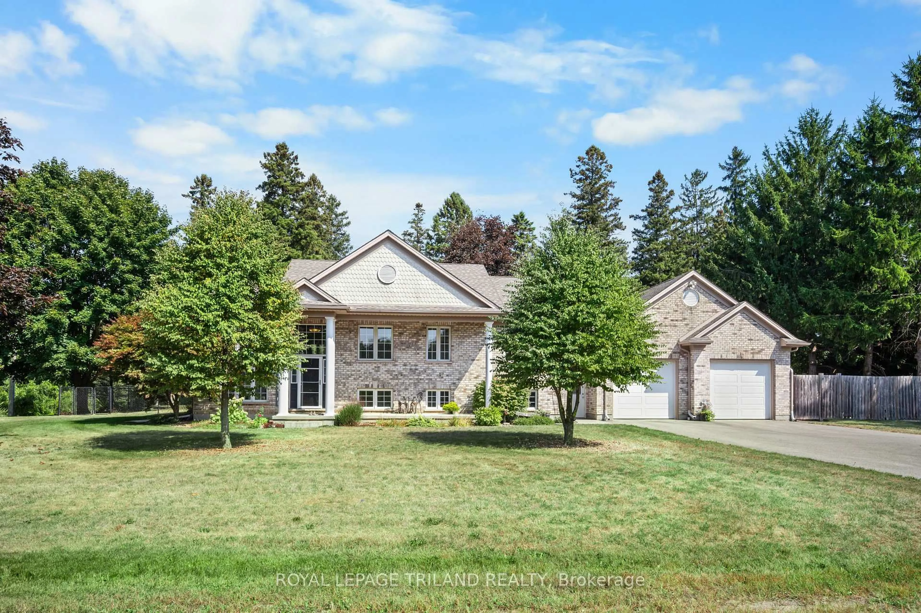 A pic from outside/outdoor area/front of a property/back of a property/a pic from drone, street for 2670 Putnam Rd, Thames Centre Ontario N0L 2B0