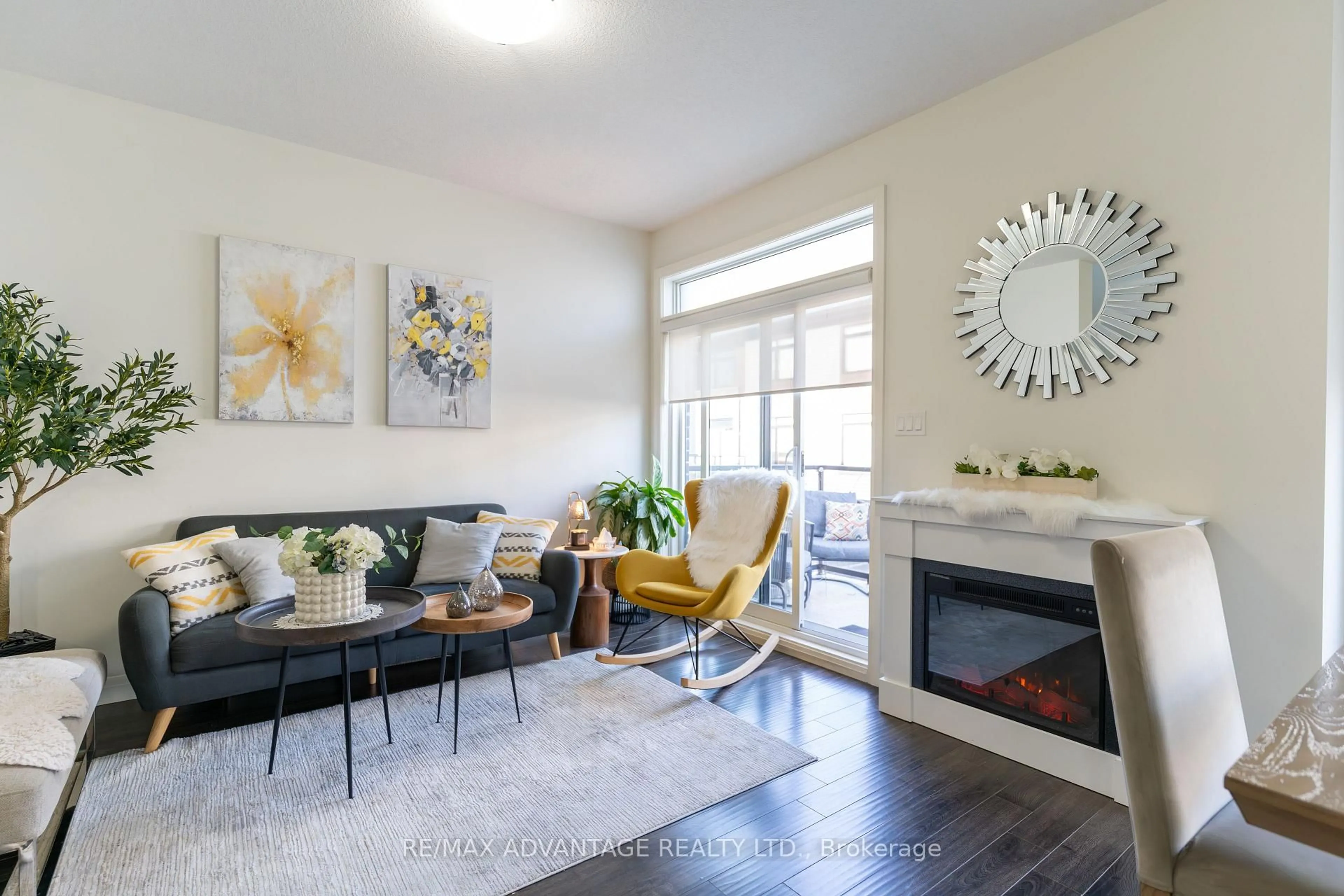 Living room with furniture, wood/laminate floor for 3260 Singleton Ave #66, London South Ontario N6L 0E7