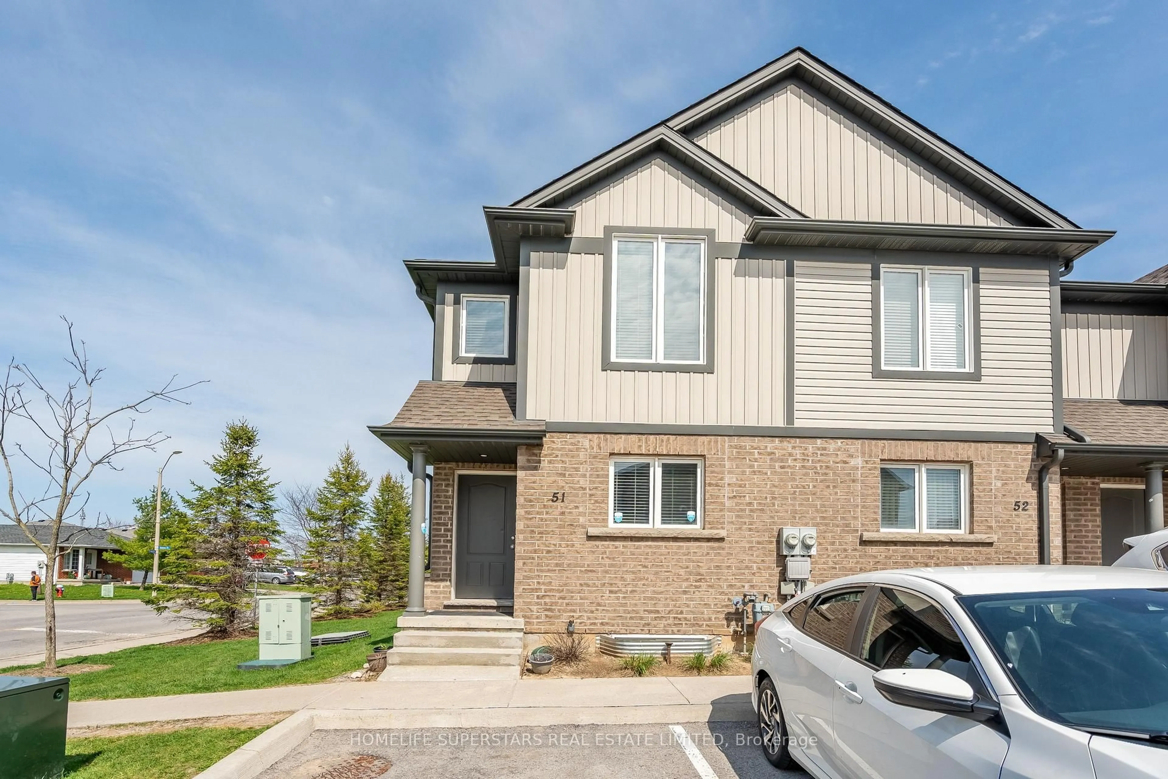 Home with brick exterior material, street for 7768 ASCOT Circ #51, Niagara Falls Ontario L2H 3P9