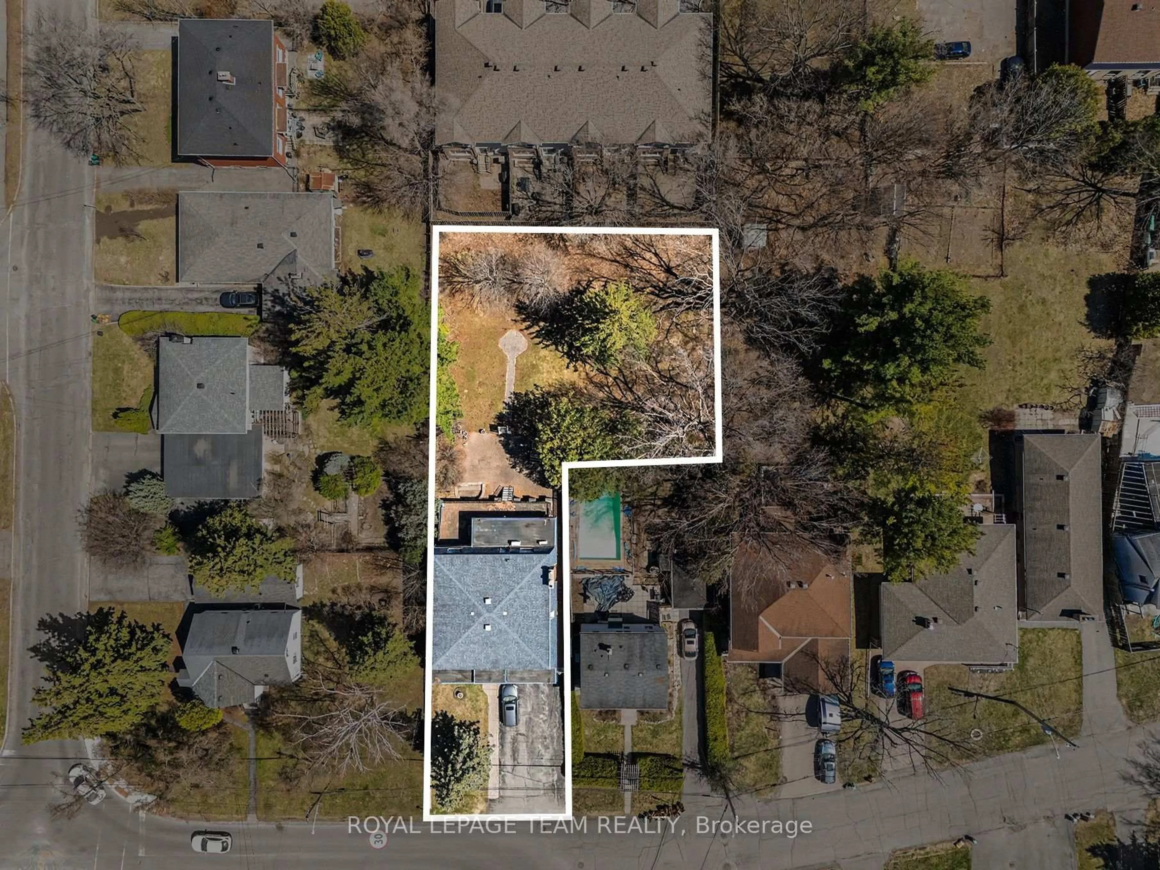 A pic from outside/outdoor area/front of a property/back of a property/a pic from drone, street for 429 Ancaster Ave, Ottawa Ontario K2B 5B6