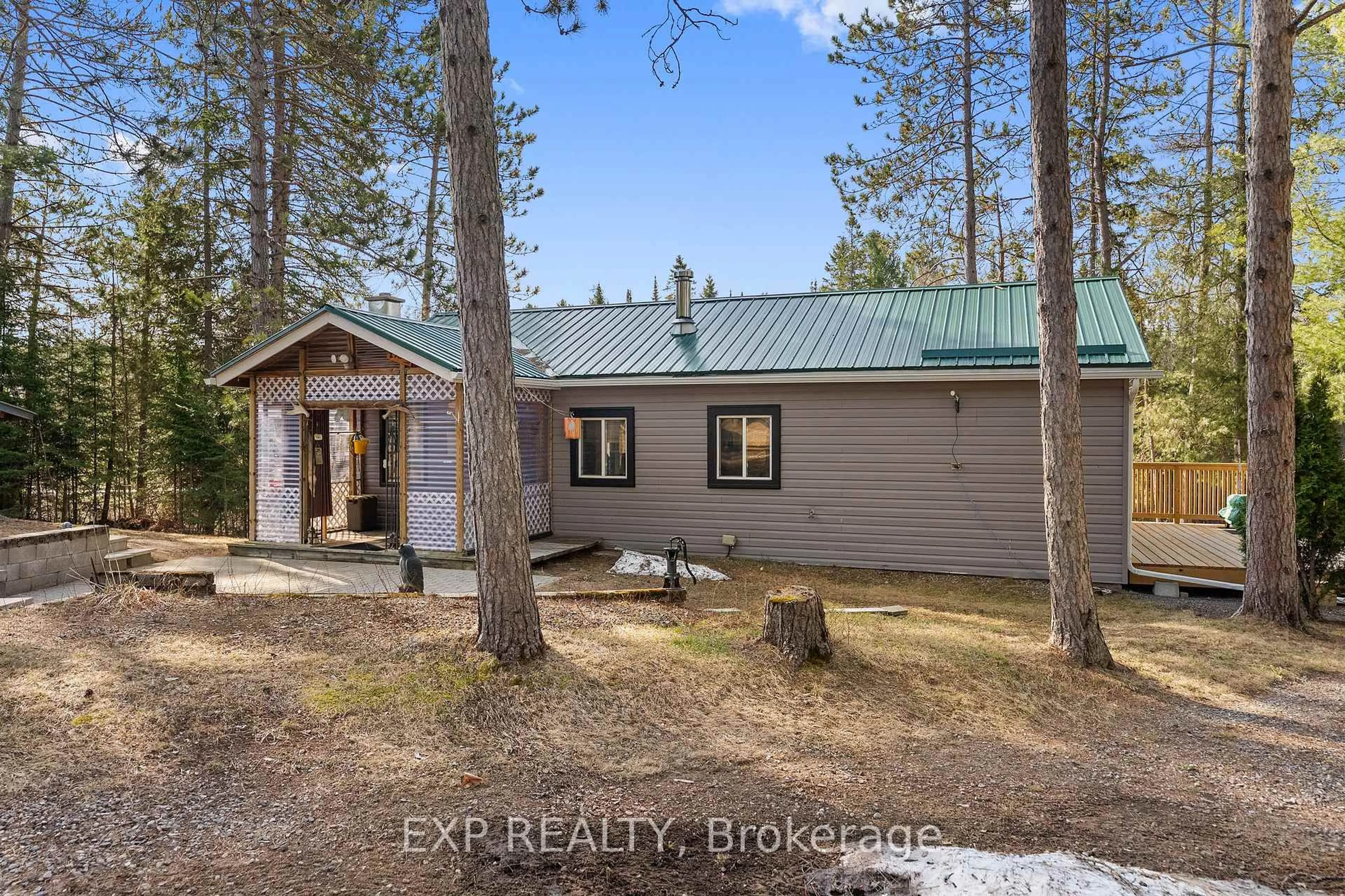 A pic from outside/outdoor area/front of a property/back of a property/a pic from drone, forest/trees view for 2401 127 Highway, Maynooth Ontario K0L 2K0