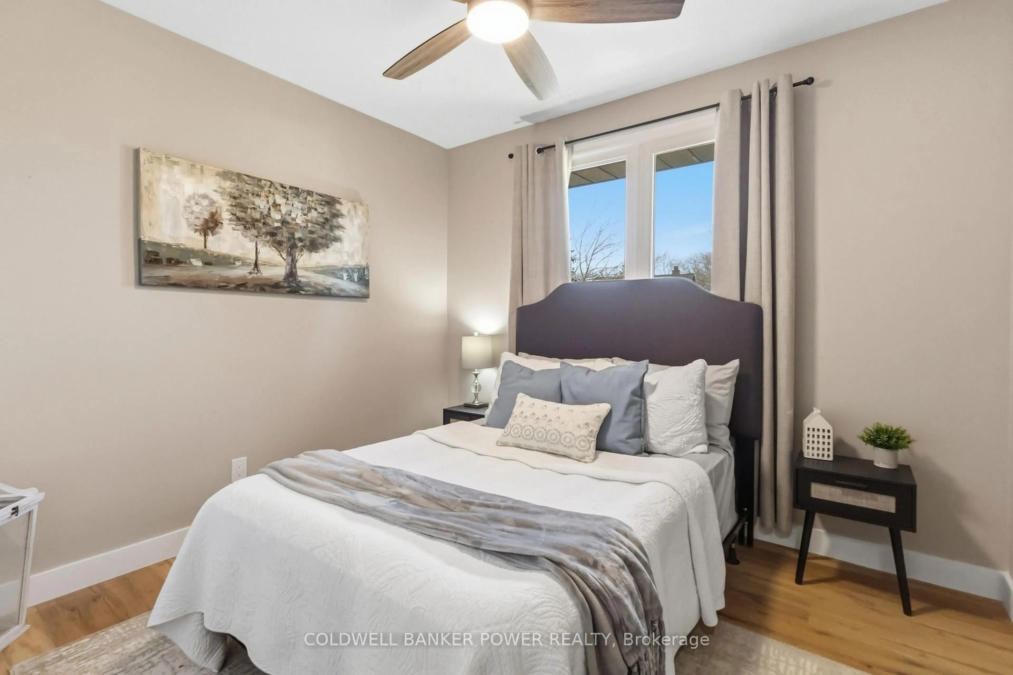 Bedroom with bed, wood/laminate floor for 176 Canterbury Dr, Thames Centre Ontario N0L 1G3