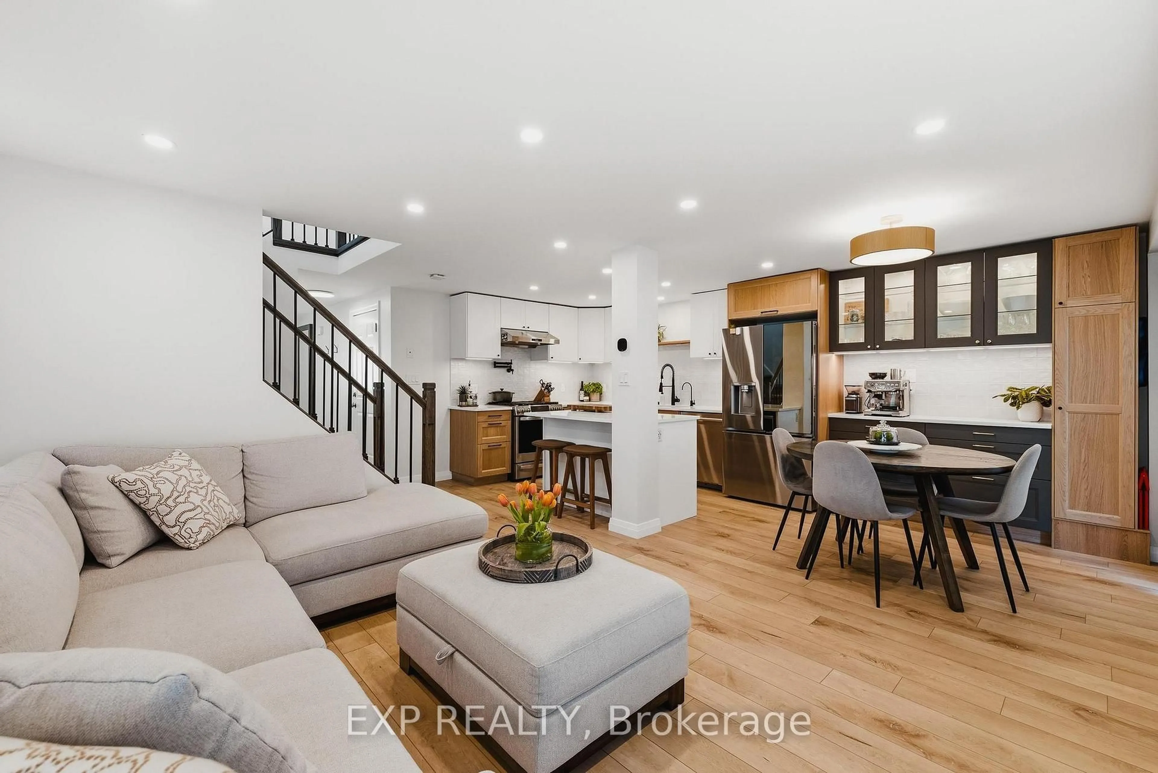Open concept kitchen, wood/laminate floor for 218 Prosperity Dr, Kitchener Ontario N2E 4E5