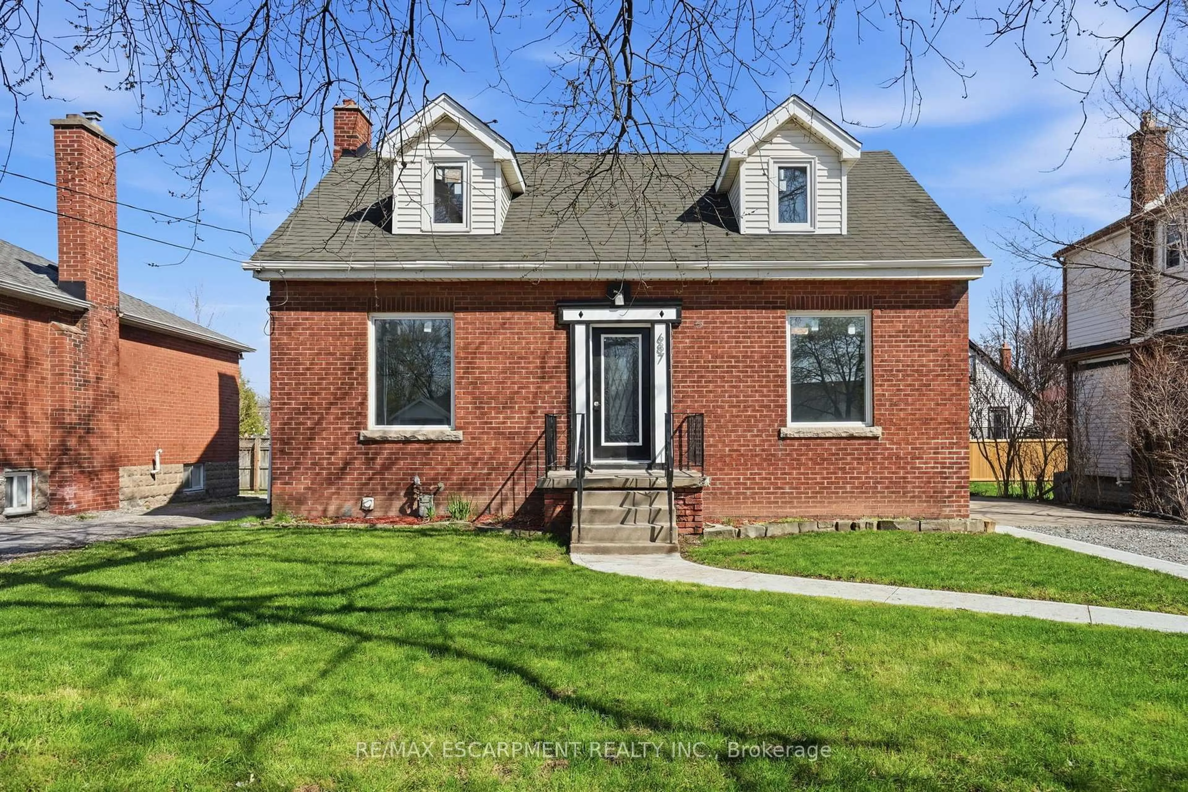Home with brick exterior material, street for 687 Upper James St, Hamilton Ontario L9C 2Z4