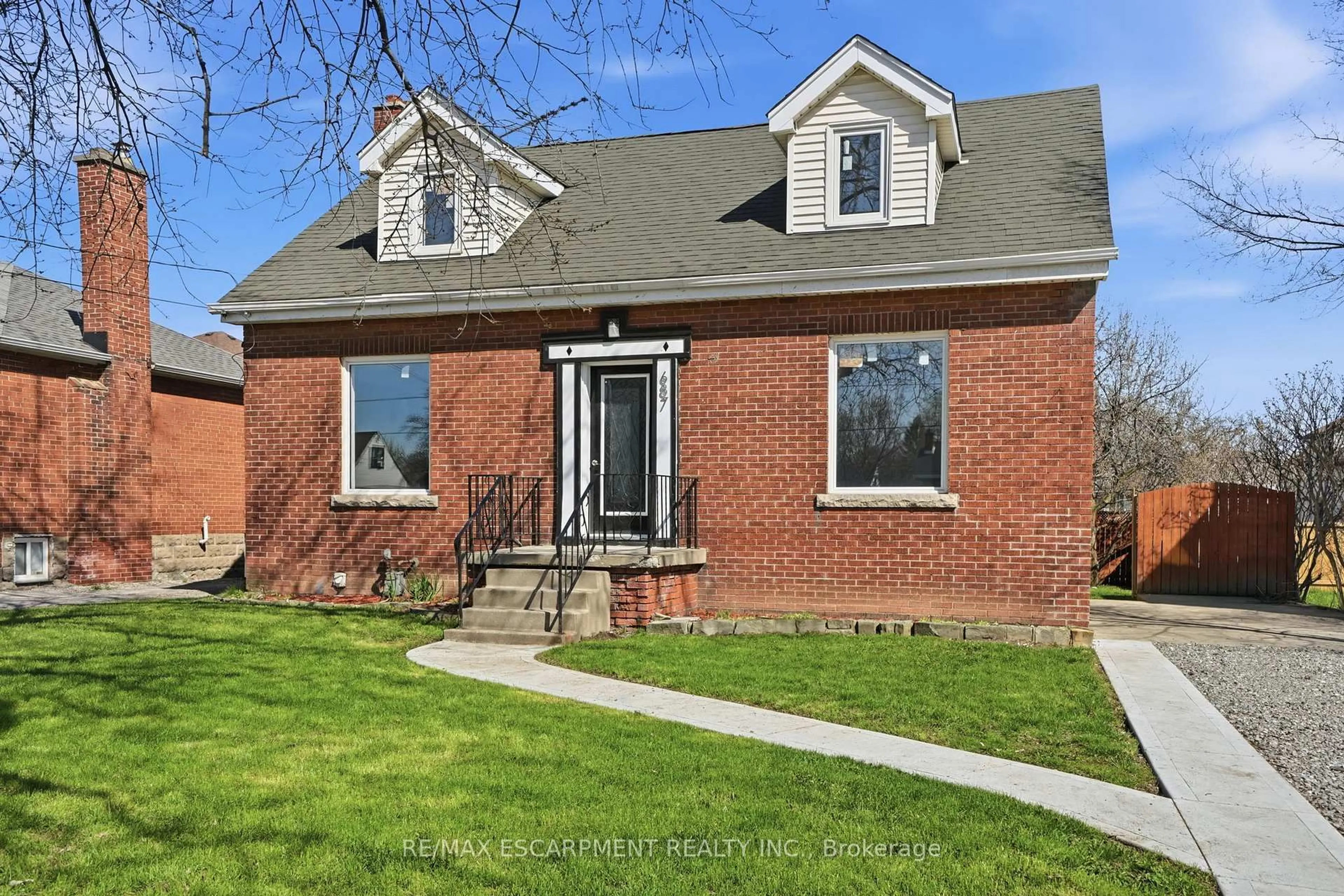 Home with brick exterior material, street for 687 Upper James St, Hamilton Ontario L9C 2Z4