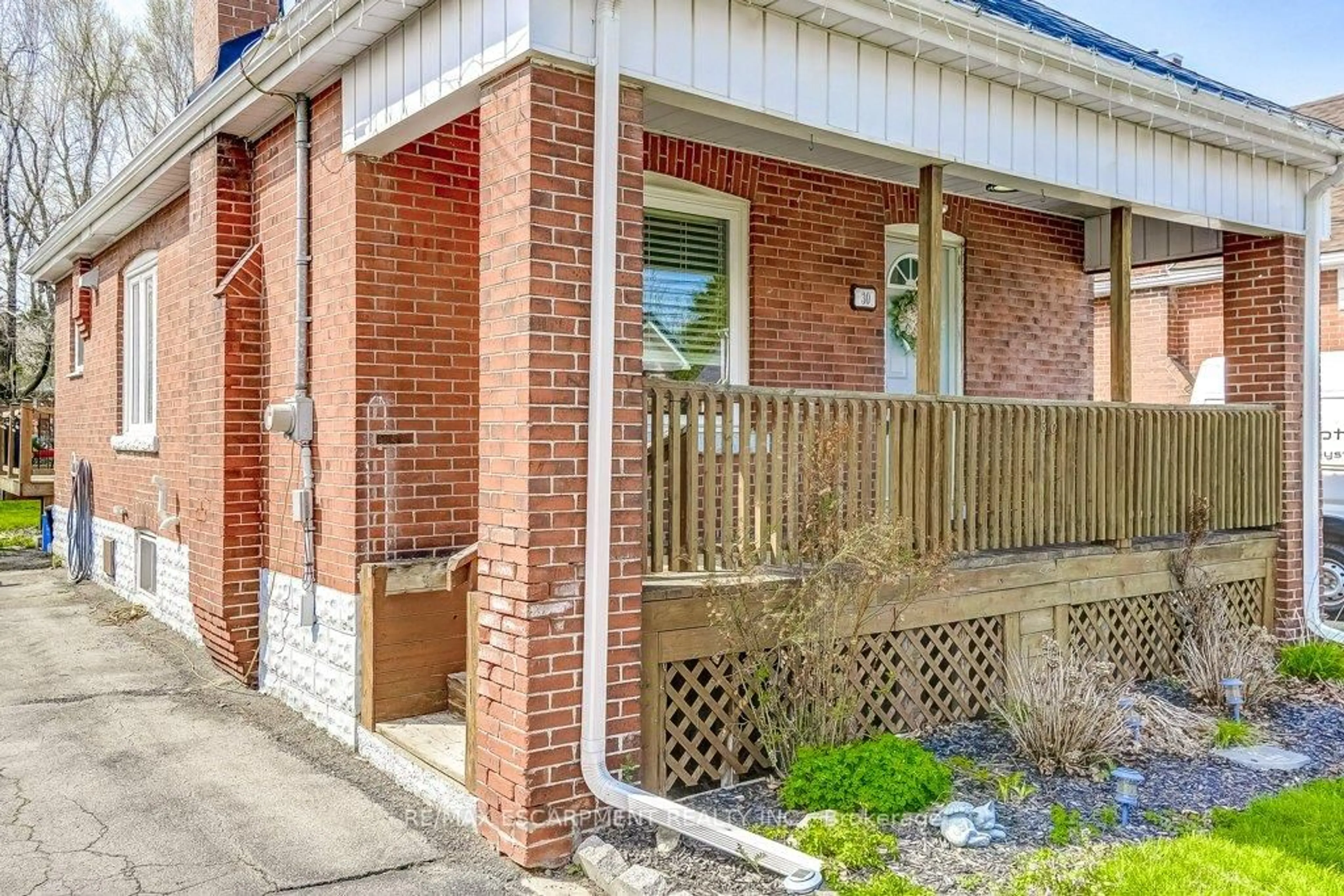 Home with brick exterior material, street for 30 East 15th St, Hamilton Ontario L9A 3E7