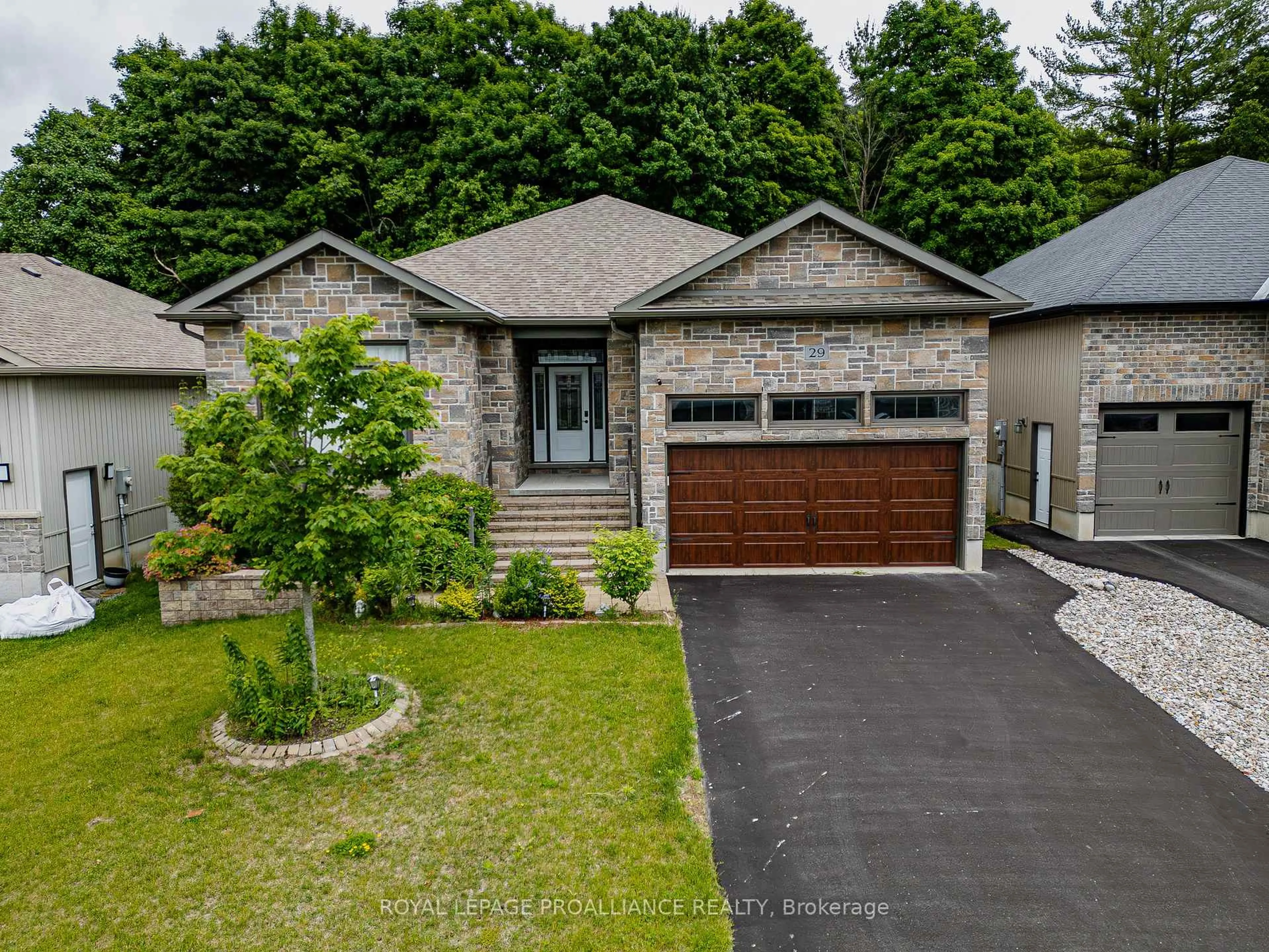 A pic from outside/outdoor area/front of a property/back of a property/a pic from drone, street for 29 Autumn Grve, Ingleside Ontario K8V 5P4