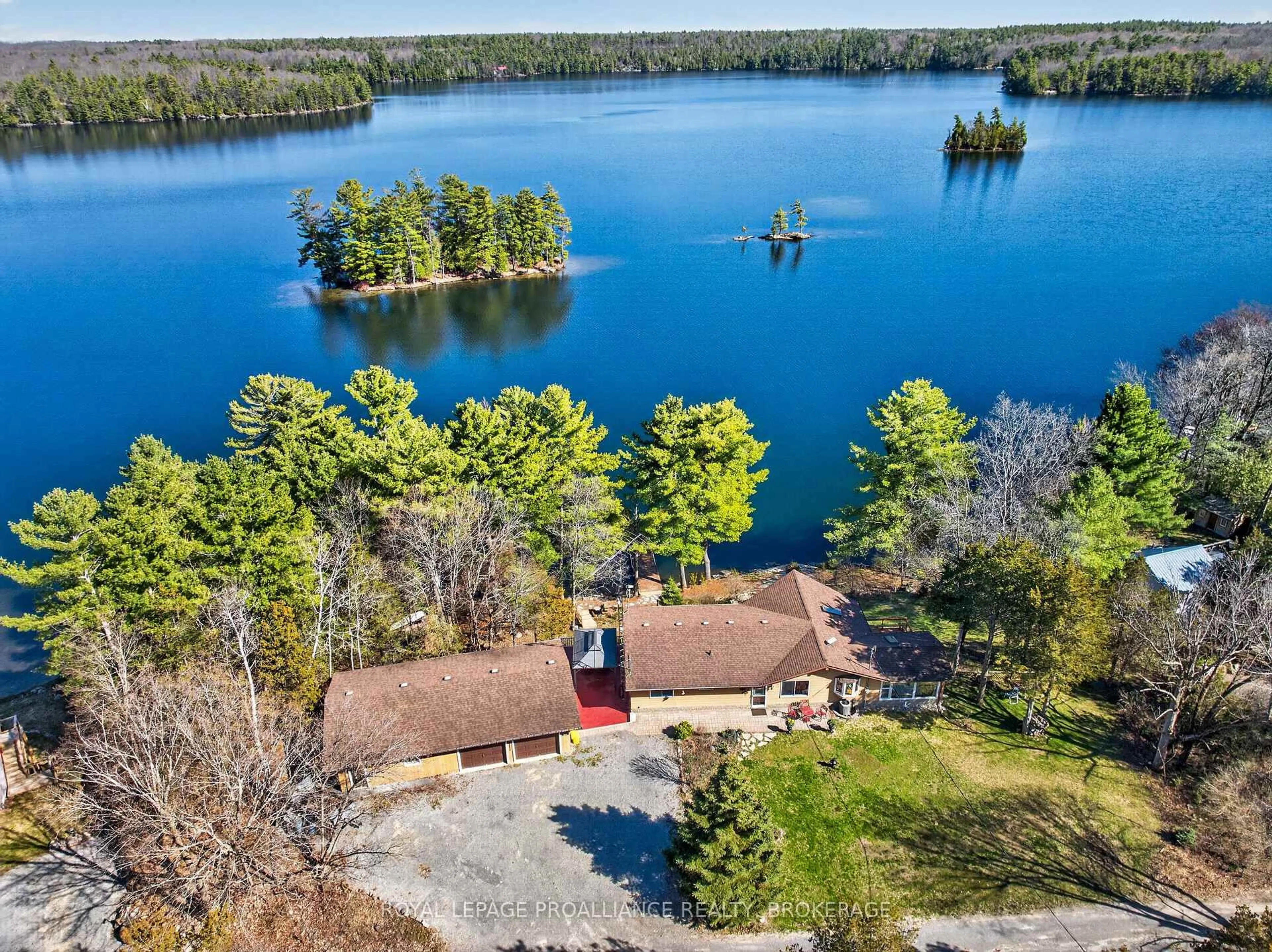 A pic from outside/outdoor area/front of a property/back of a property/a pic from drone, water/lake/river/ocean view for 3037 Hilltop Lane, Perth Road Ontario K0H 2L0