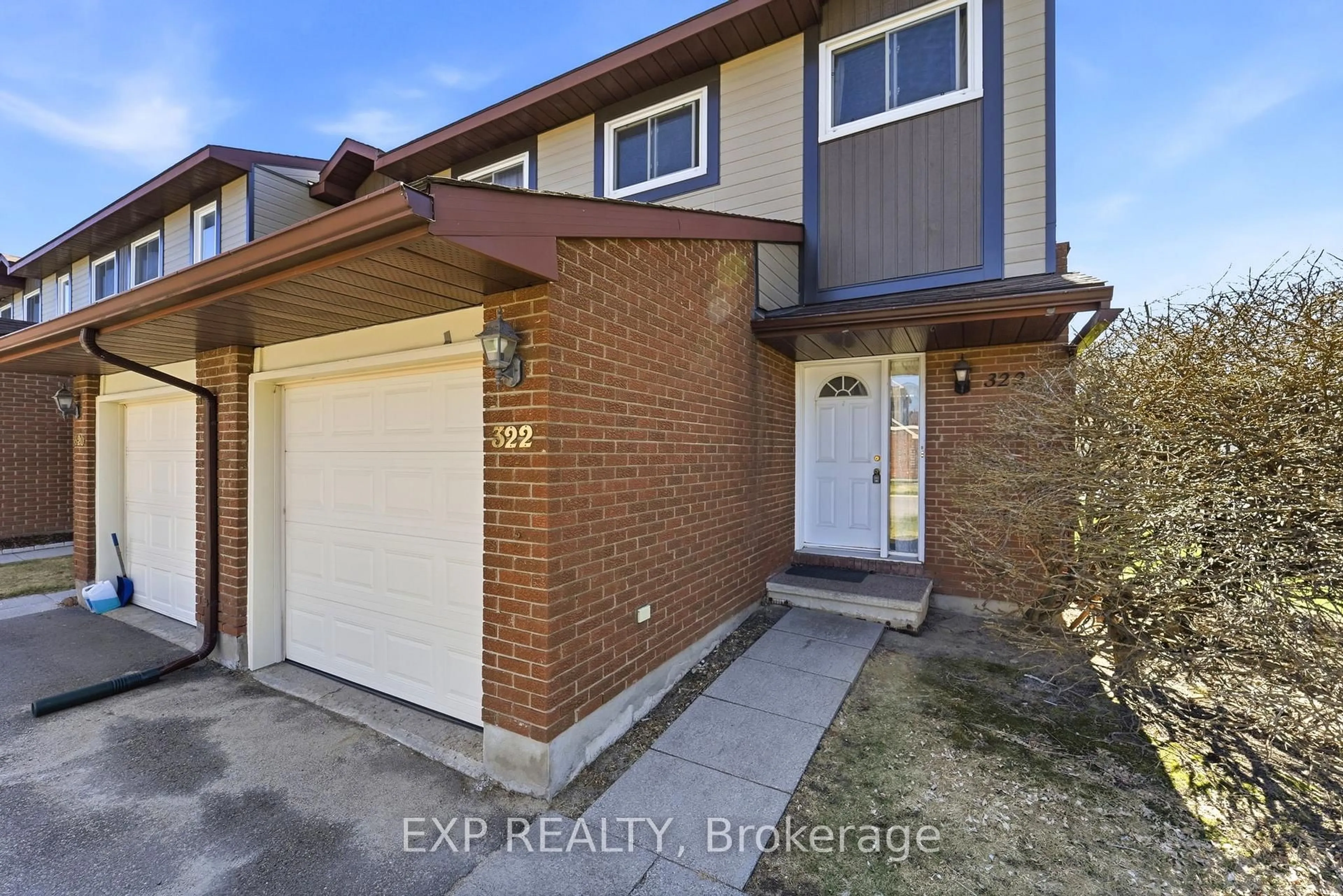 Home with brick exterior material, street for 322 Robillard Private #8, Ottawa Ontario K1T 2V8