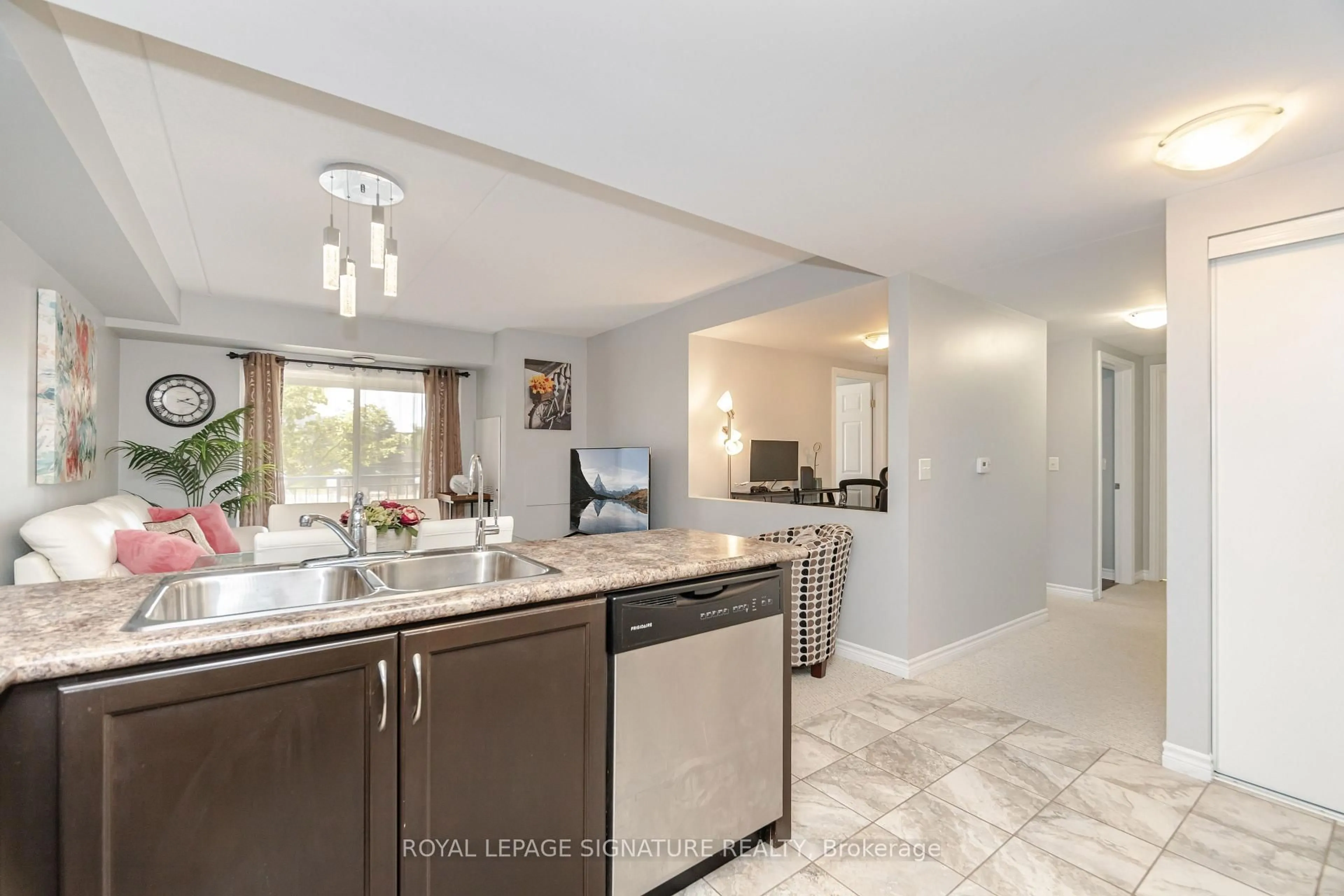 Open concept kitchen, ceramic/tile floor for 67 Kingsbury Sq #111, Guelph Ontario N1L 0L3