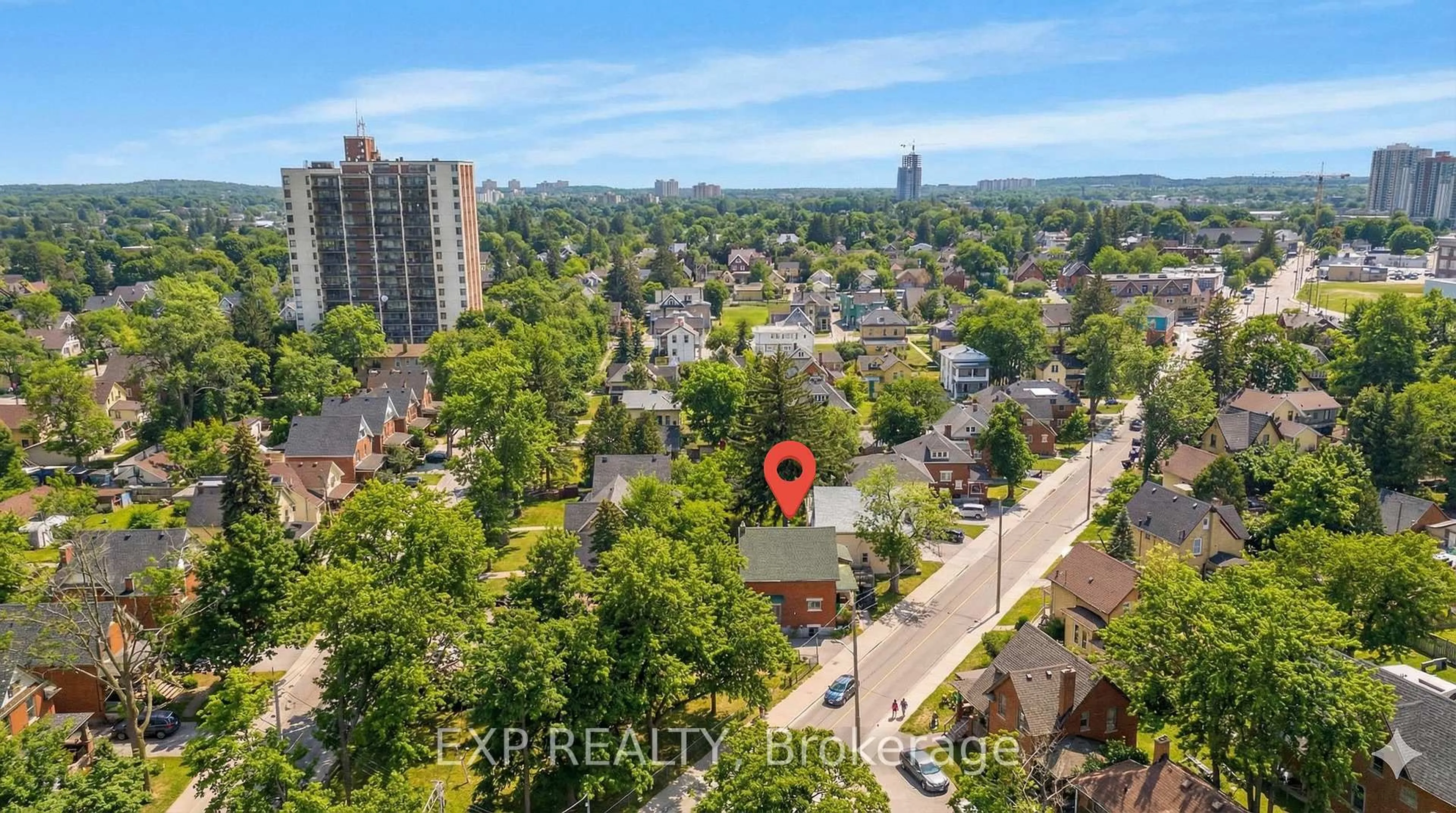 A pic from outside/outdoor area/front of a property/back of a property/a pic from drone, city buildings view from balcony for 64 Lancaster St, Kitchener Ontario N2H 1M6
