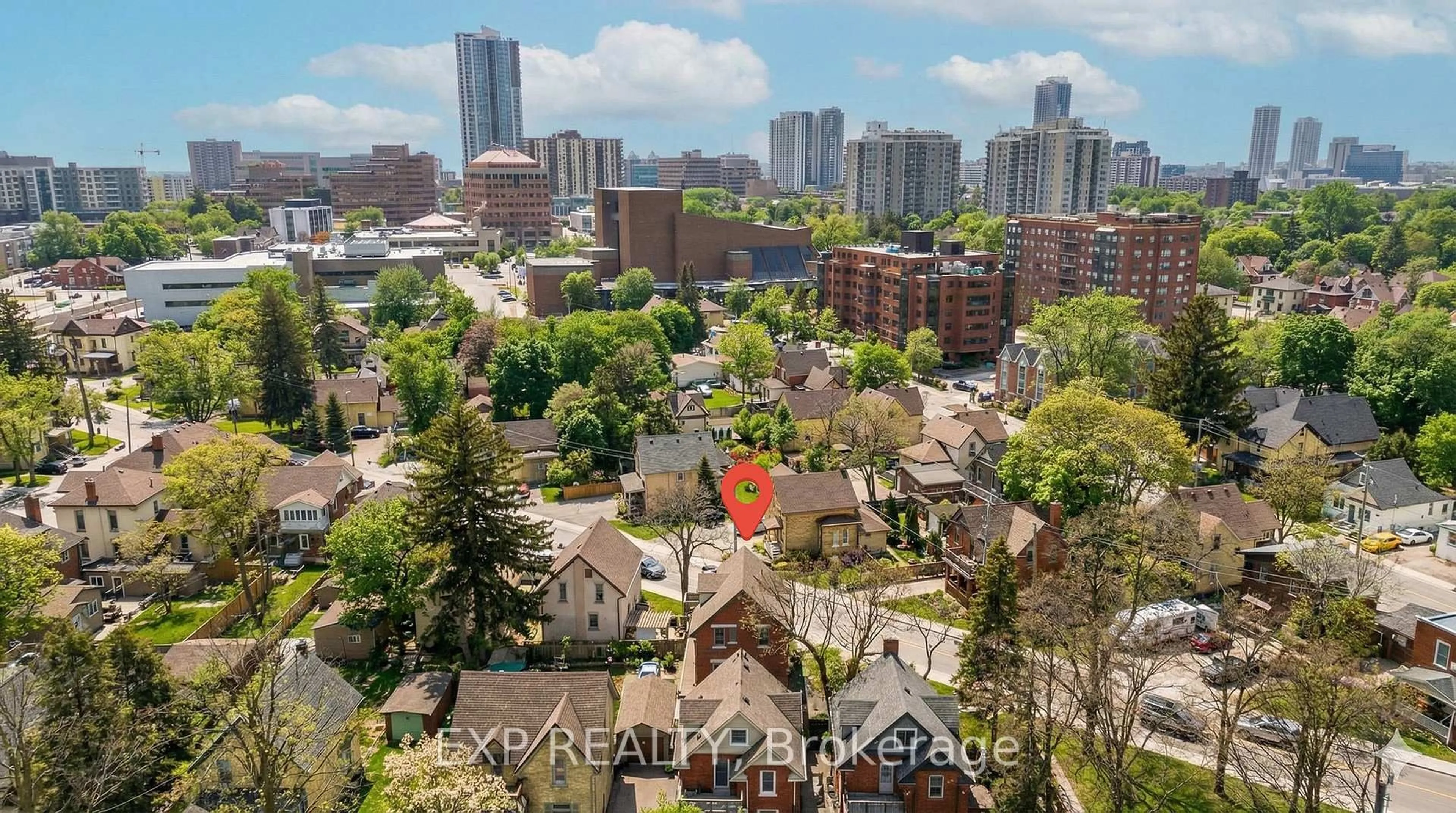 A pic from outside/outdoor area/front of a property/back of a property/a pic from drone, city buildings view from balcony for 64 Lancaster St, Kitchener Ontario N2H 1M6