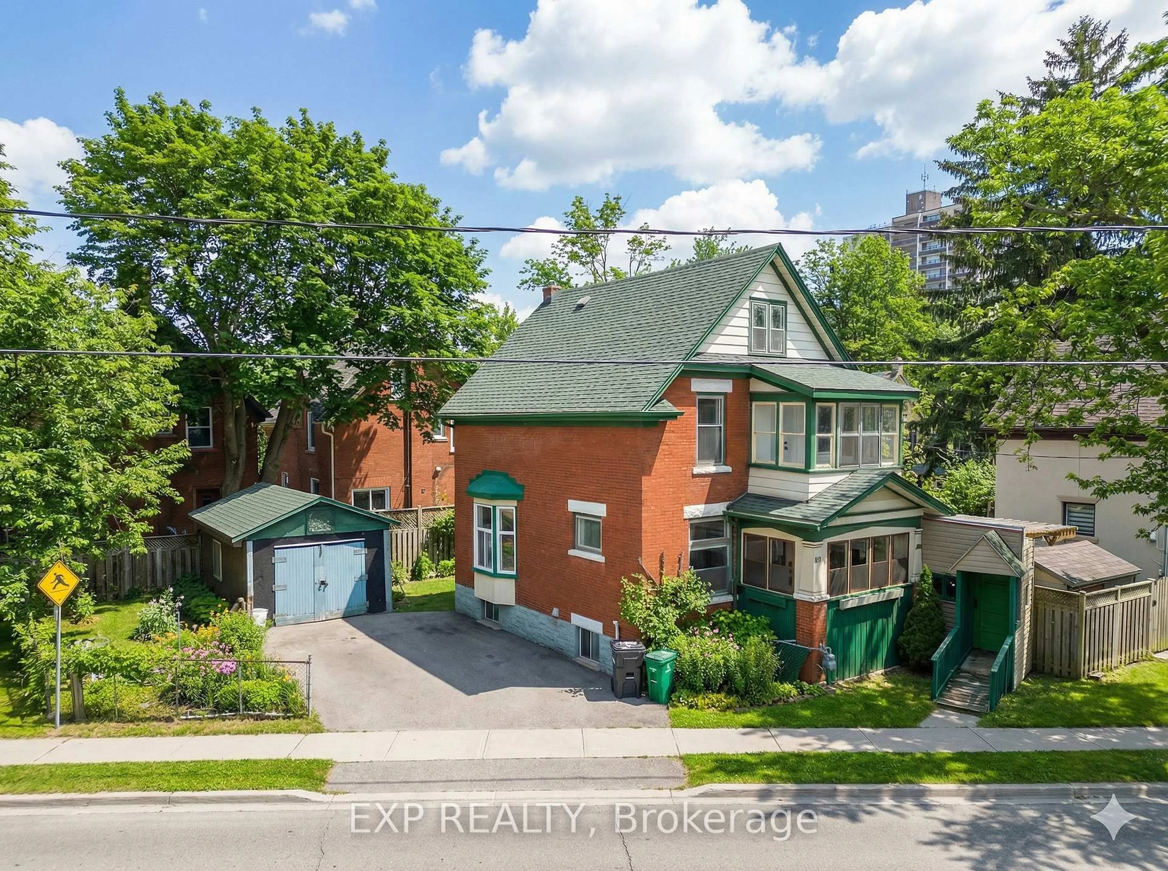 A pic from outside/outdoor area/front of a property/back of a property/a pic from drone, street for 64 Lancaster St, Kitchener Ontario N2H 1M6