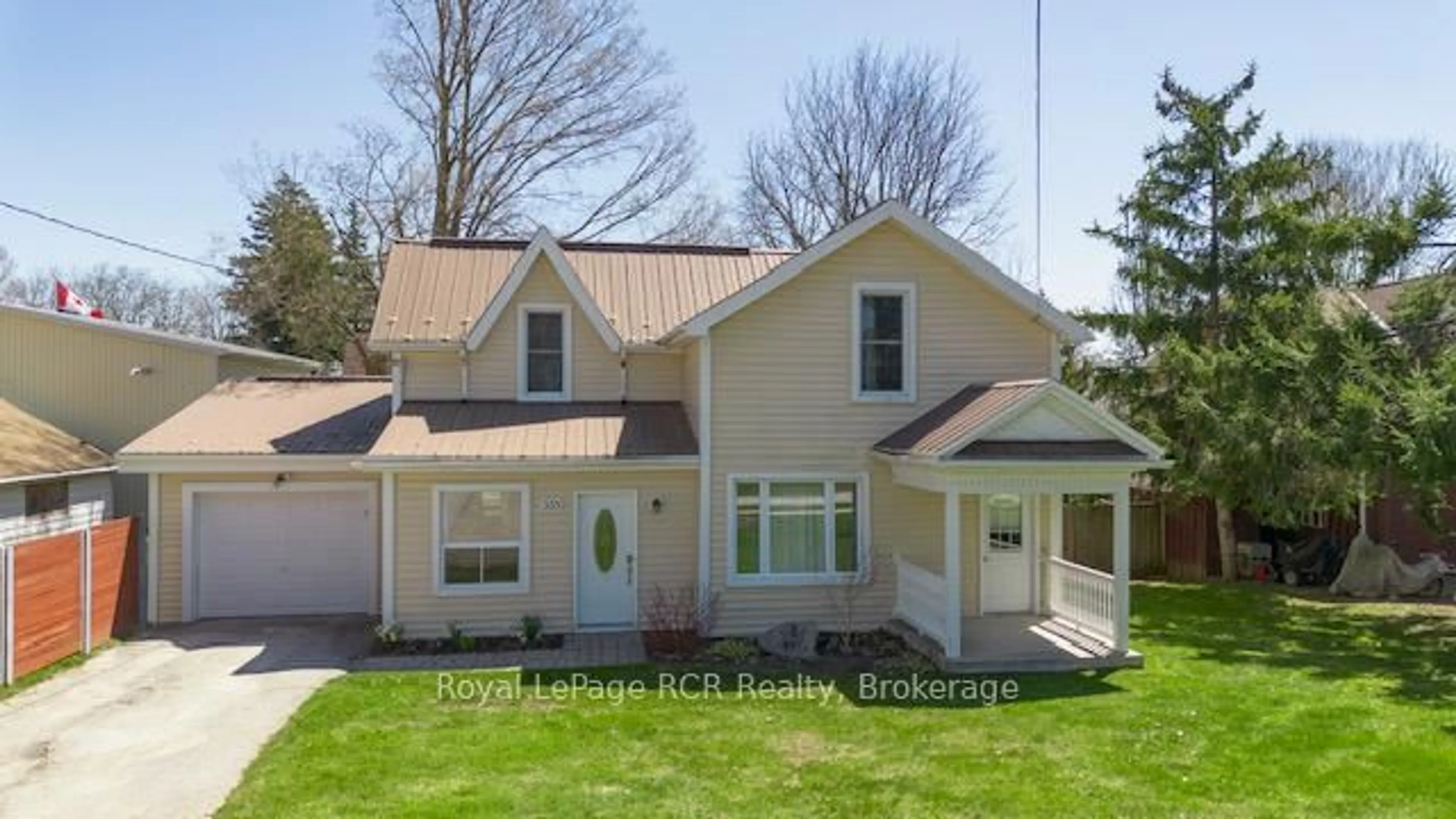 Home with vinyl exterior material, street for 335 Ross St, Huron-Kinloss Ontario N0G 2H0