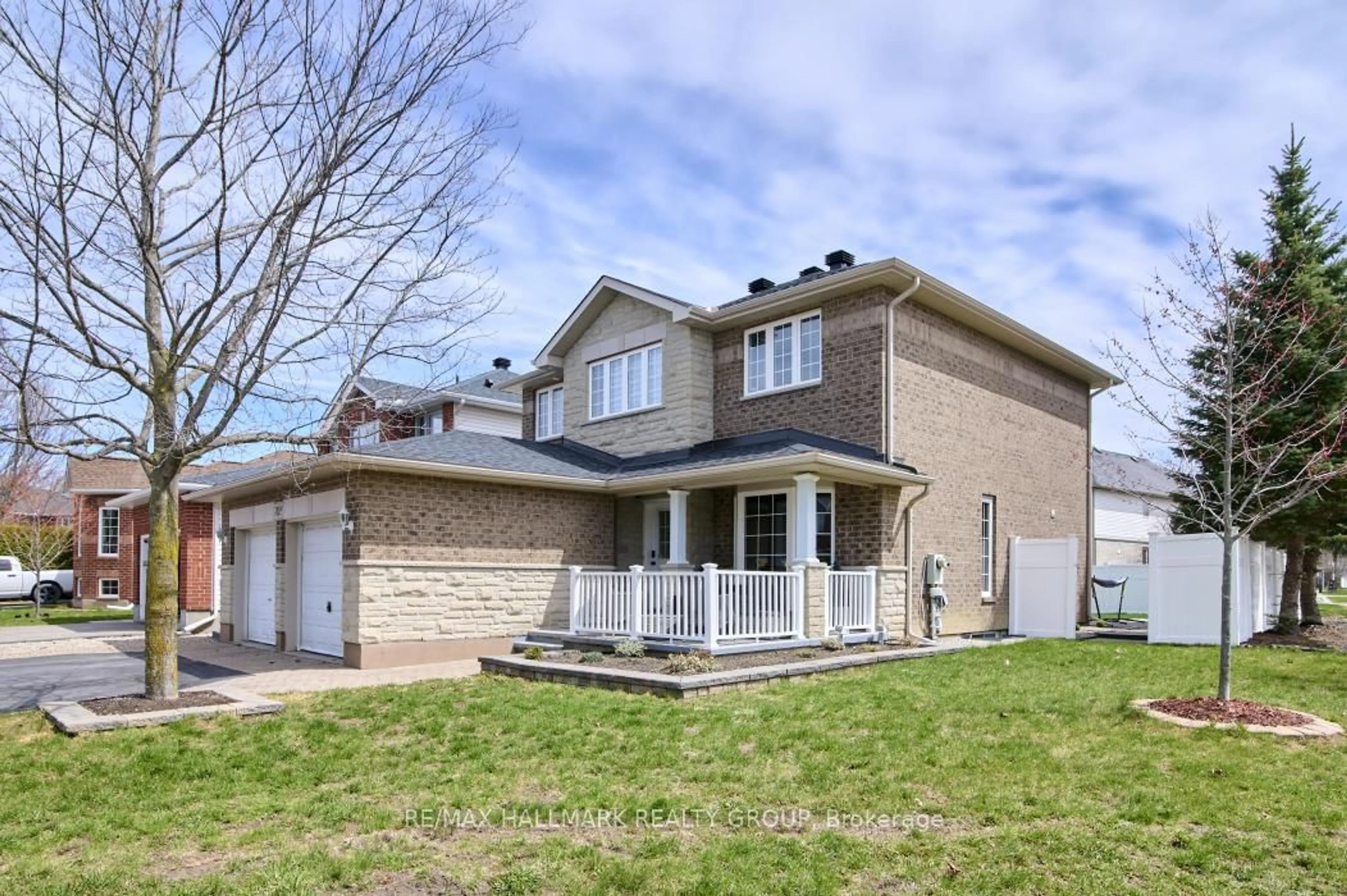 Home with brick exterior material, street for 702 Mud Creek Cres, Ottawa Ontario K1V 1W3