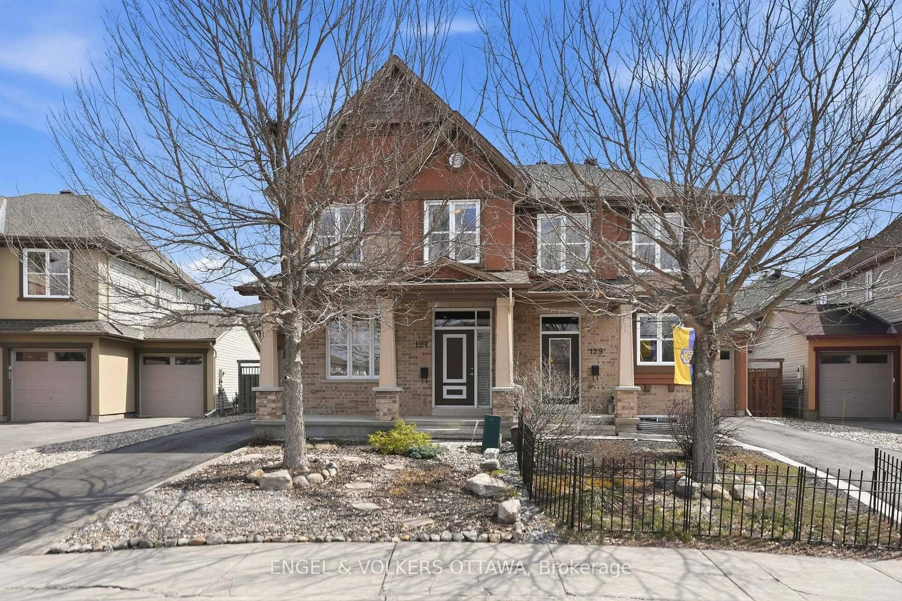 Home with brick exterior material, street for 127 Beatrice Dr, Ottawa Ontario K2J 5A4