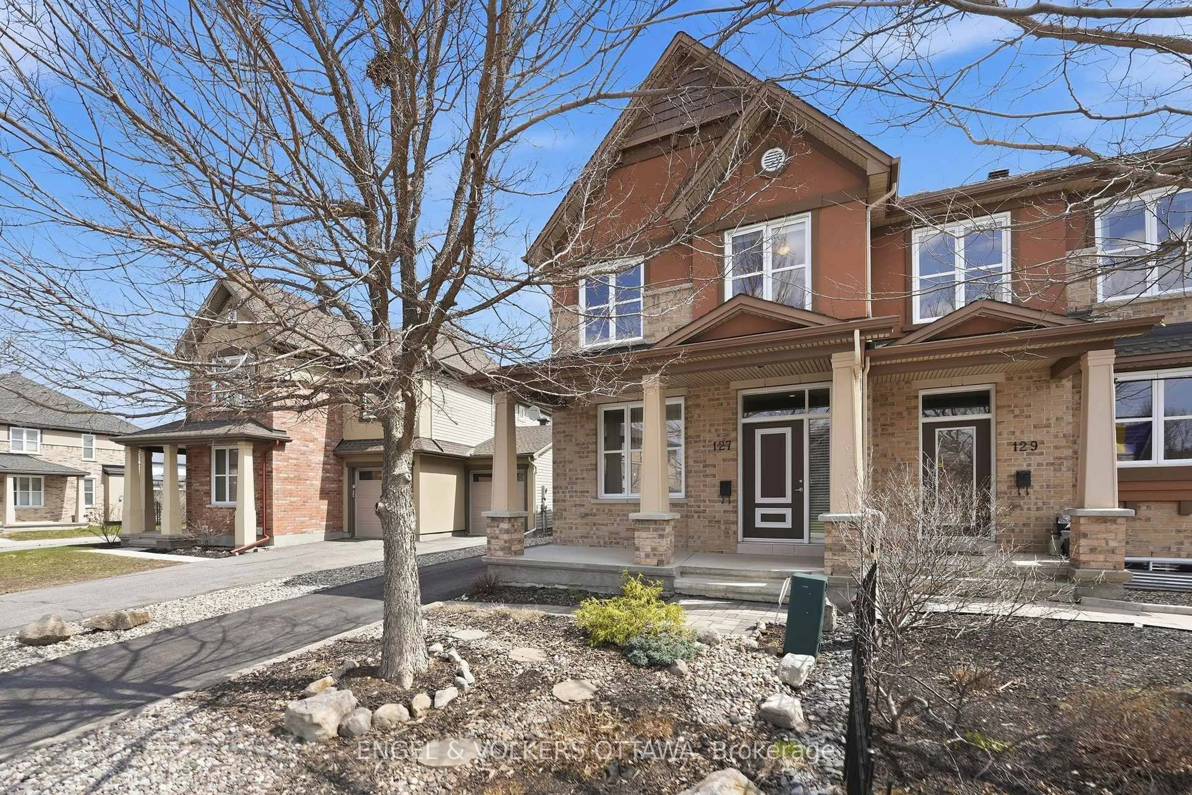 Home with brick exterior material, street for 127 Beatrice Dr, Ottawa Ontario K2J 5A4