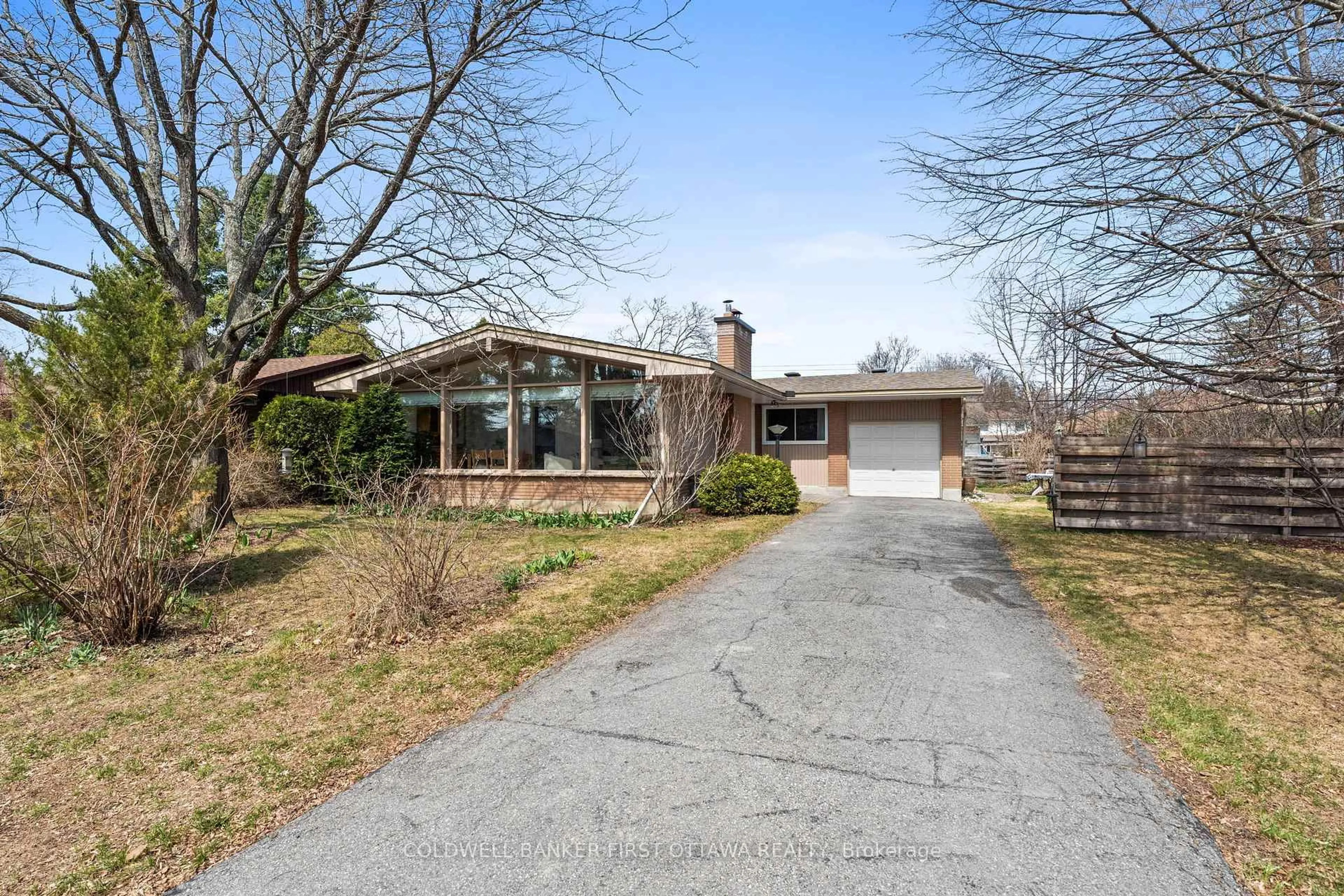 Home with brick exterior material, street for 54 Evergreen Dr, Ottawa Ontario K2H 6C9