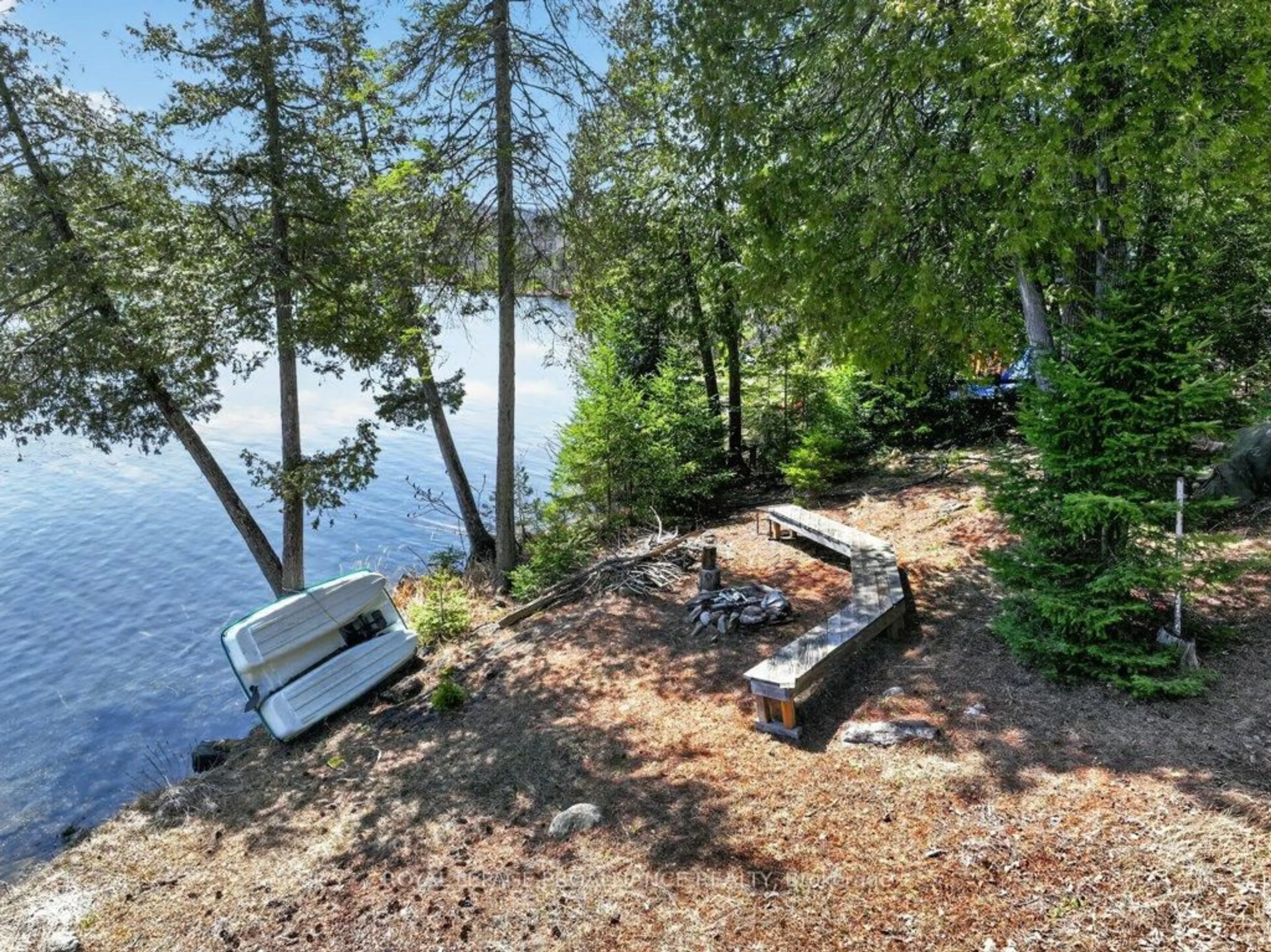 A pic from outside/outdoor area/front of a property/back of a property/a pic from drone, water/lake/river/ocean view for 1138A Watkins Lane, Ardoch Ontario K0H 1C0