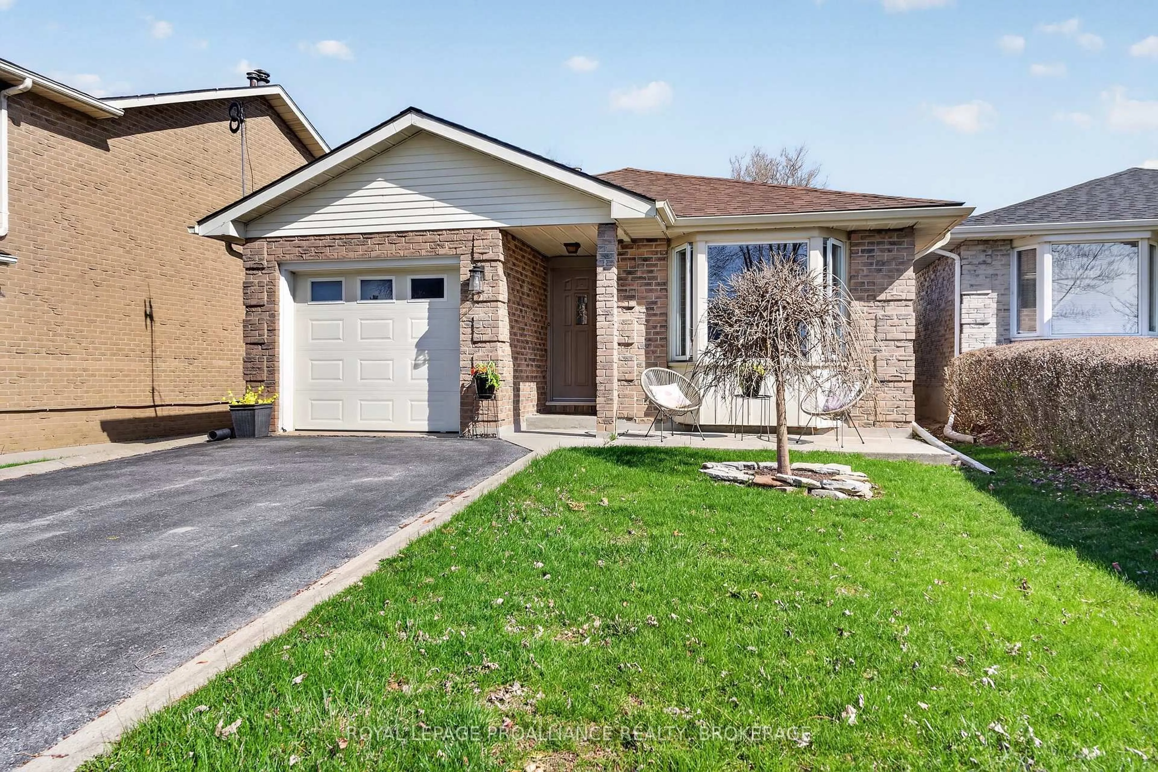 Home with brick exterior material, street for 16 Grenadier Dr, Kingston Ontario K7K 6E8