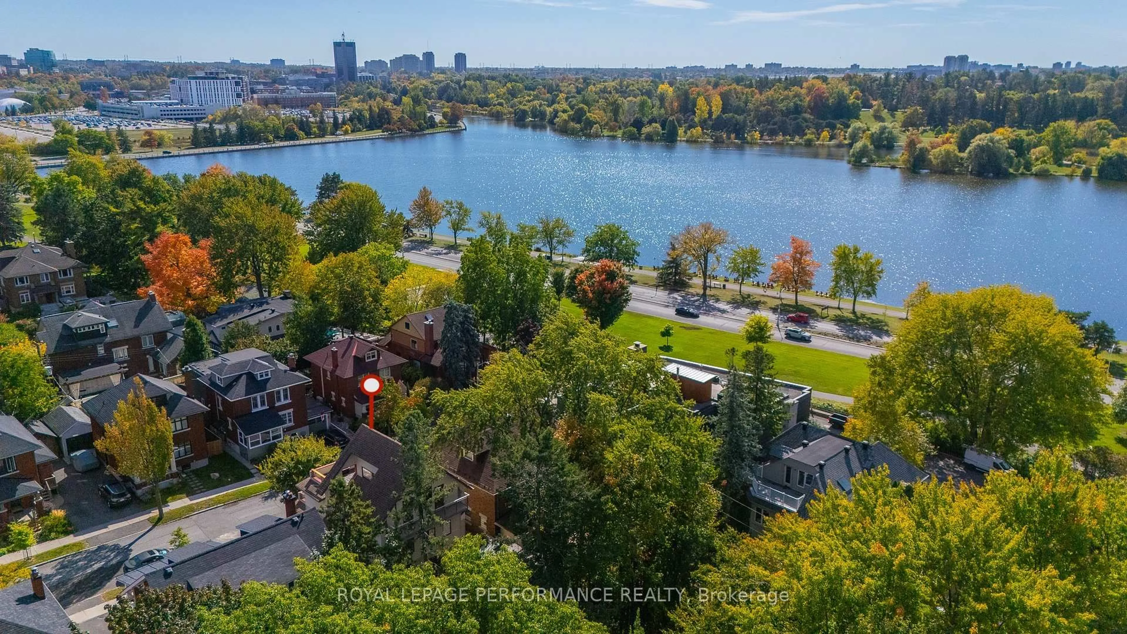 A pic from outside/outdoor area/front of a property/back of a property/a pic from drone, water/lake/river/ocean view for 45 Old Sunset Blvd, Ottawa Ontario K1S 3G8