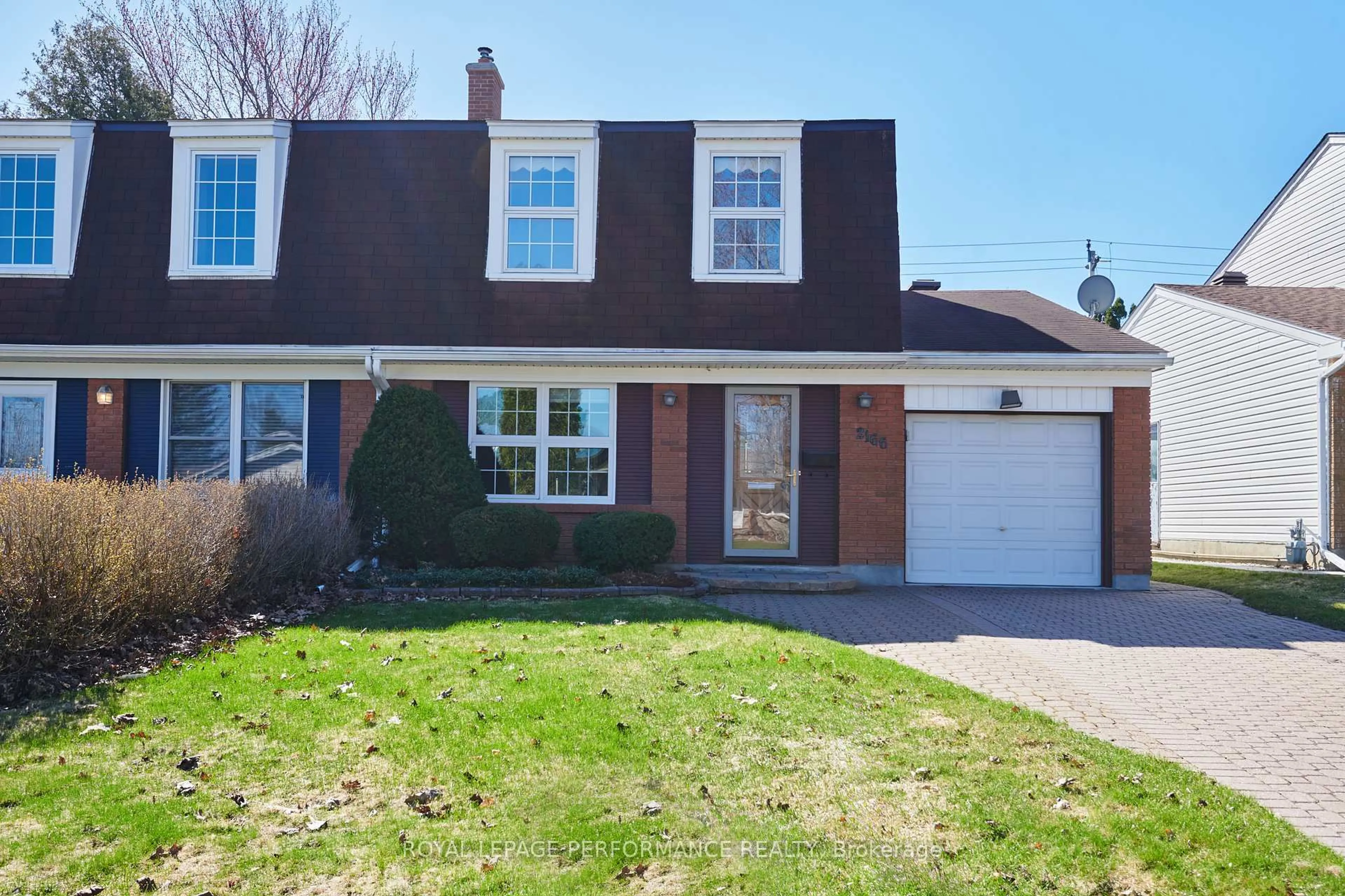 Home with vinyl exterior material, street for 2166 Bickerton Ave, Ottawa Ontario K1J 6Y3