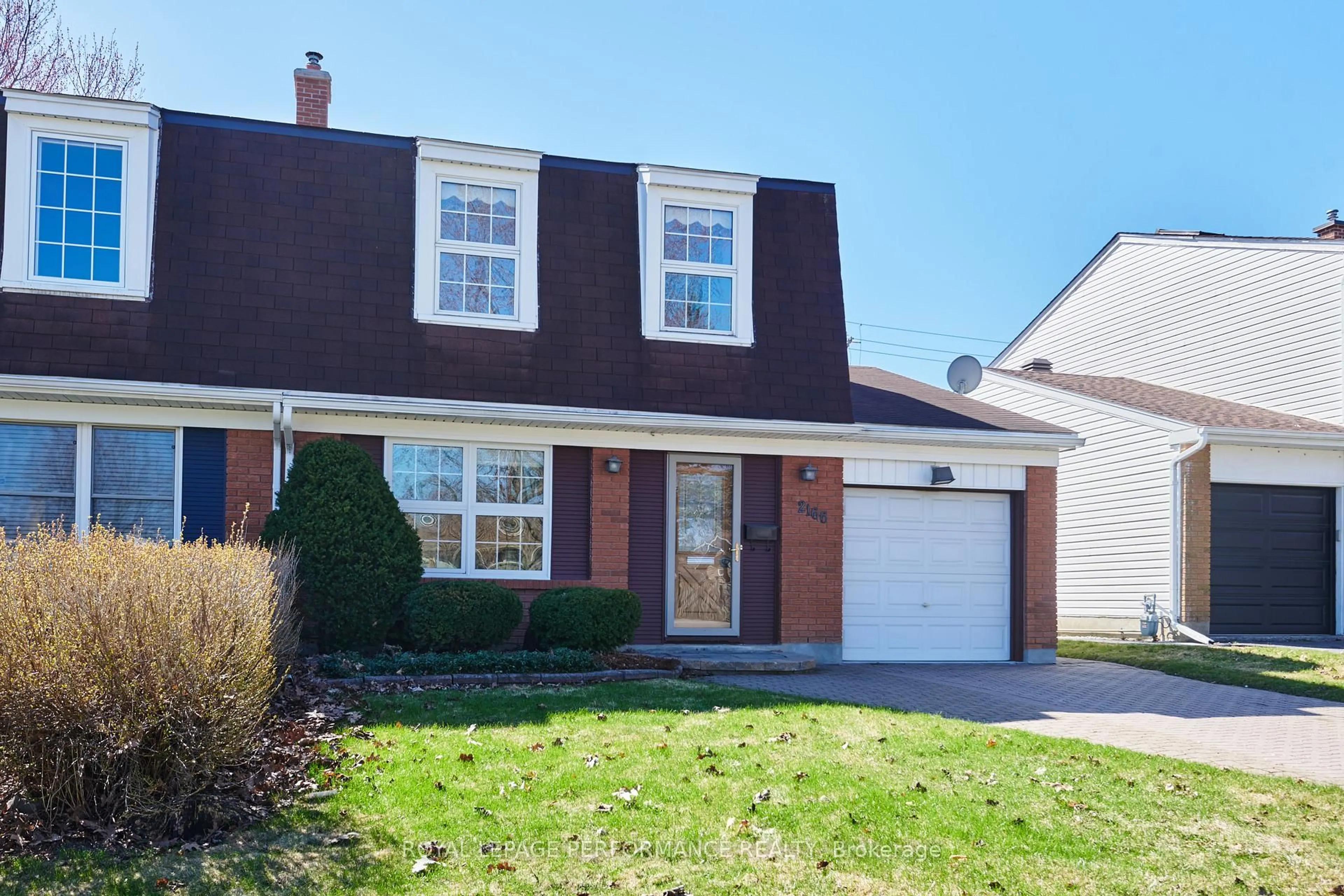 Home with vinyl exterior material, street for 2166 Bickerton Ave, Ottawa Ontario K1J 6Y3