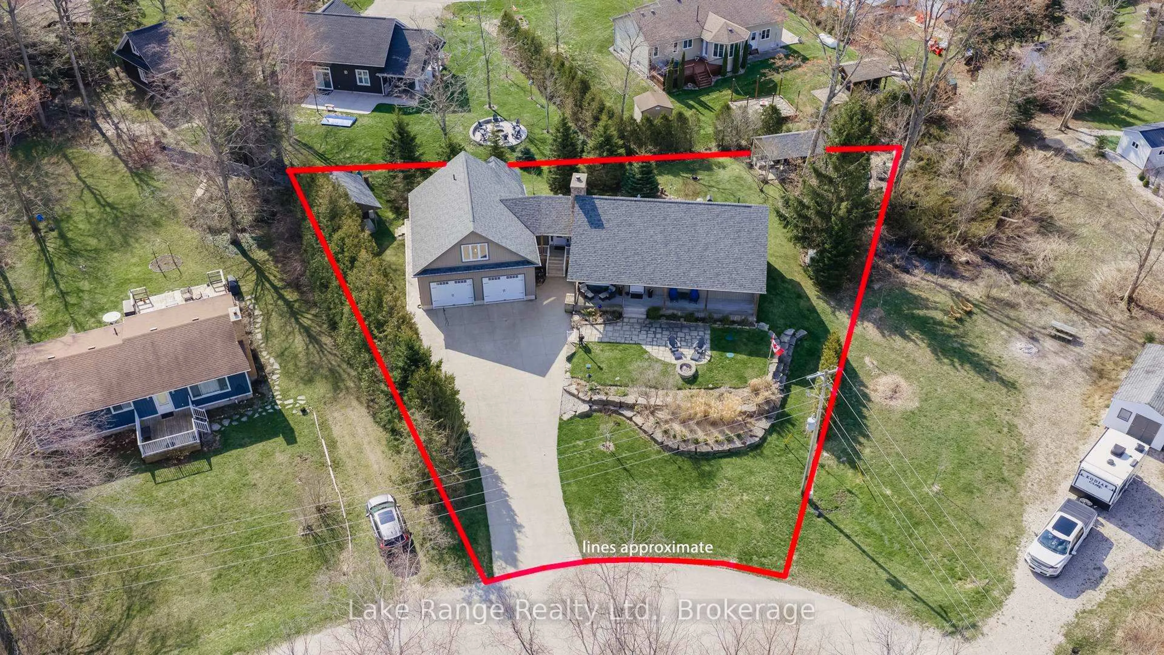 A pic from outside/outdoor area/front of a property/back of a property/a pic from drone, street for 317 Tyendinaga Rd, Huron-Kinloss Ontario N2Z 2X3