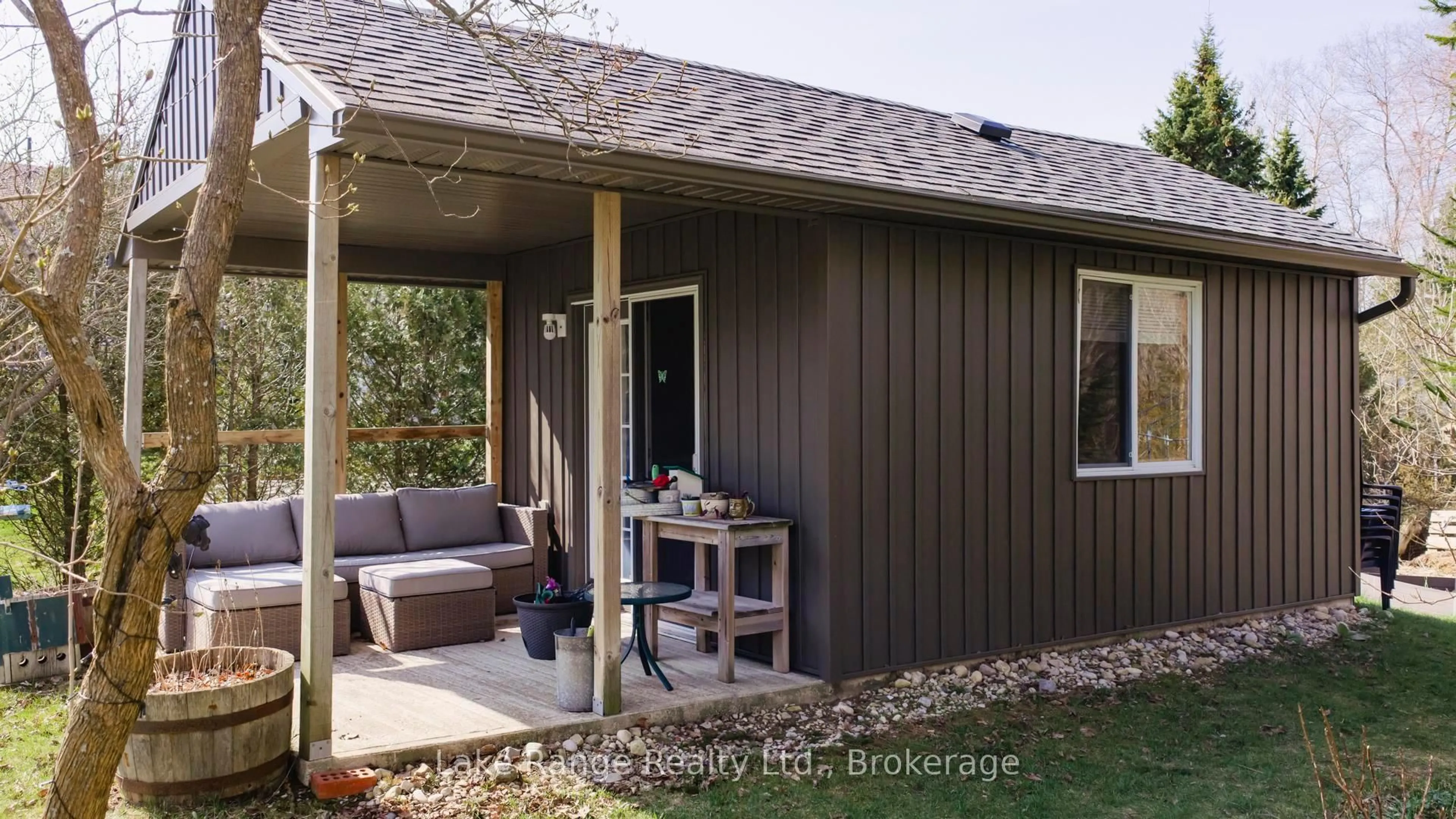 Home with vinyl exterior material, street for 317 Tyendinaga Rd, Huron-Kinloss Ontario N2Z 2X3