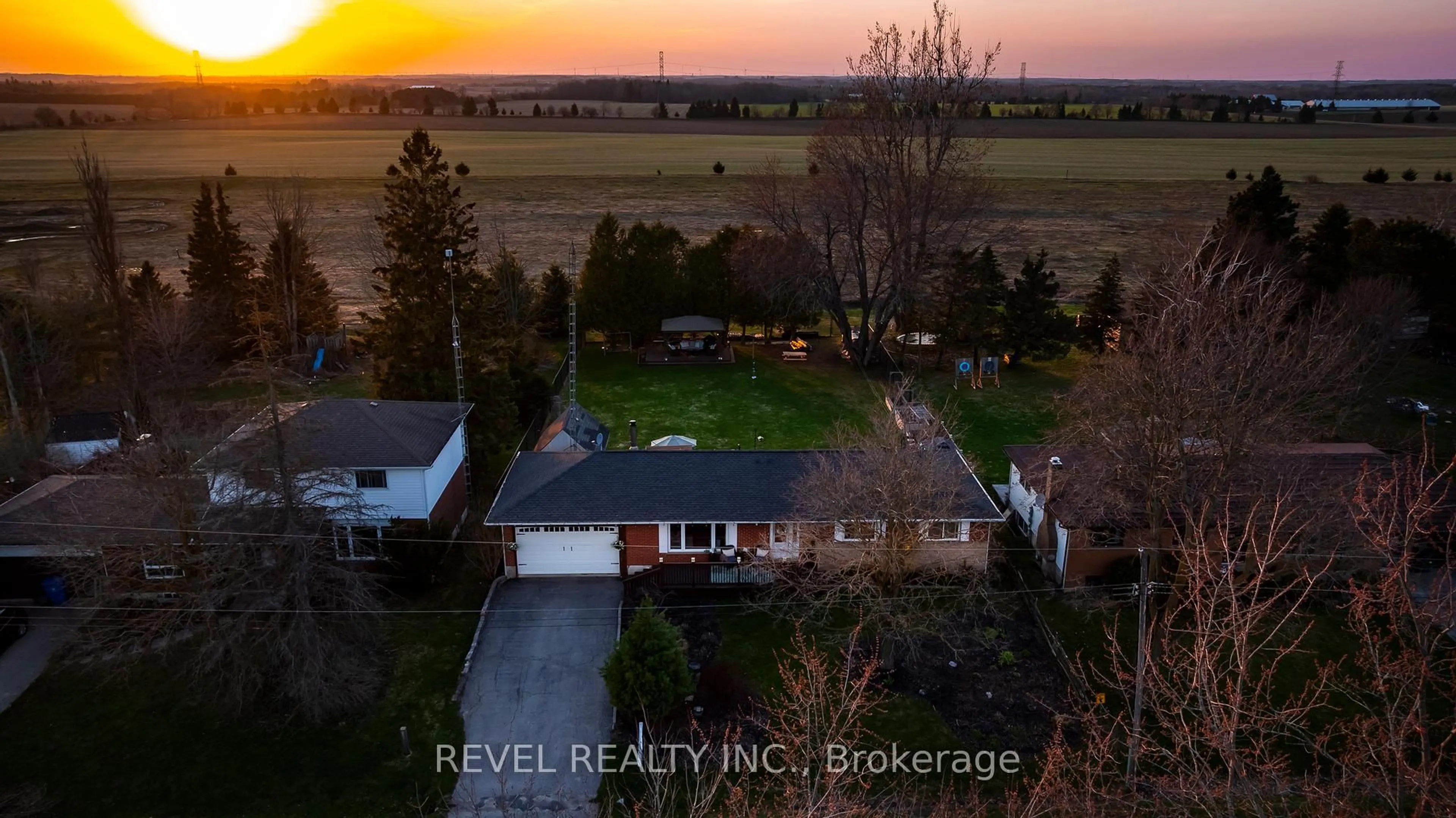 A pic from outside/outdoor area/front of a property/back of a property/a pic from drone, water/lake/river/ocean view for 12 Victoria Blvd, East Garafraxa Ontario L9W 7L6
