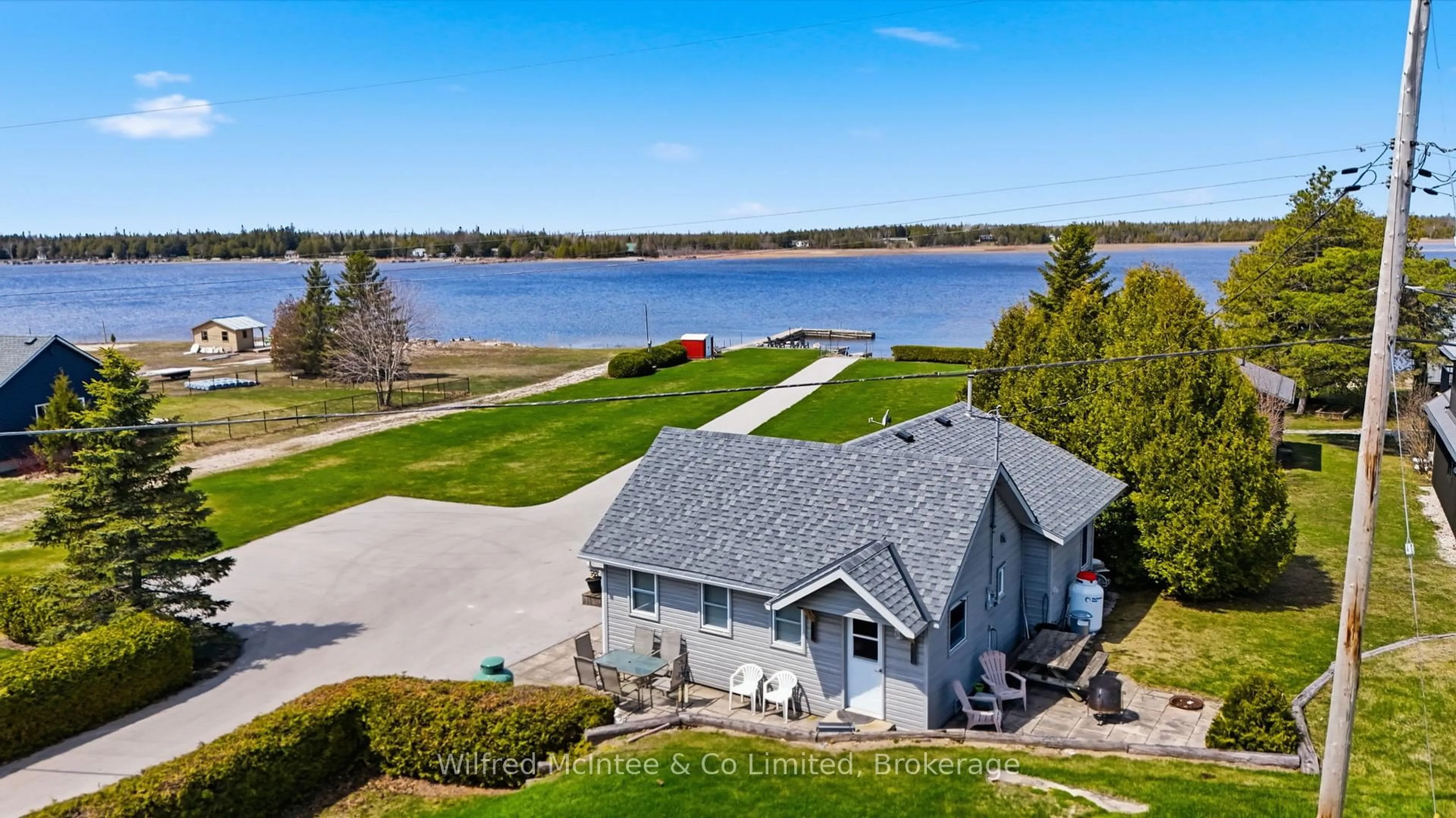 A pic from outside/outdoor area/front of a property/back of a property/a pic from drone, water/lake/river/ocean view for 834 Pike Bay Rd, Northern Bruce Peninsula Ontario N0H 2T0