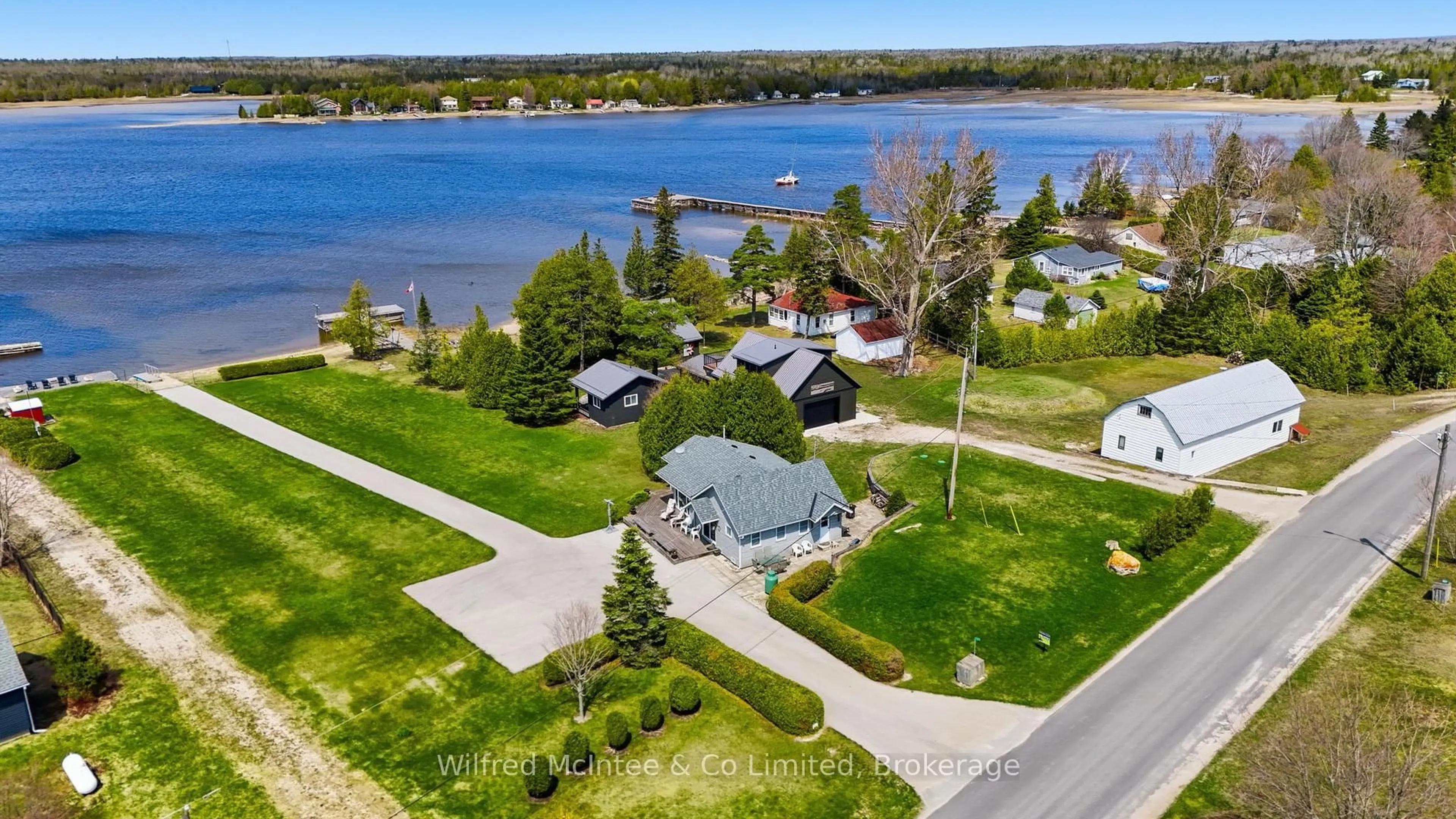 A pic from outside/outdoor area/front of a property/back of a property/a pic from drone, water/lake/river/ocean view for 834 Pike Bay Rd, Northern Bruce Peninsula Ontario N0H 2T0