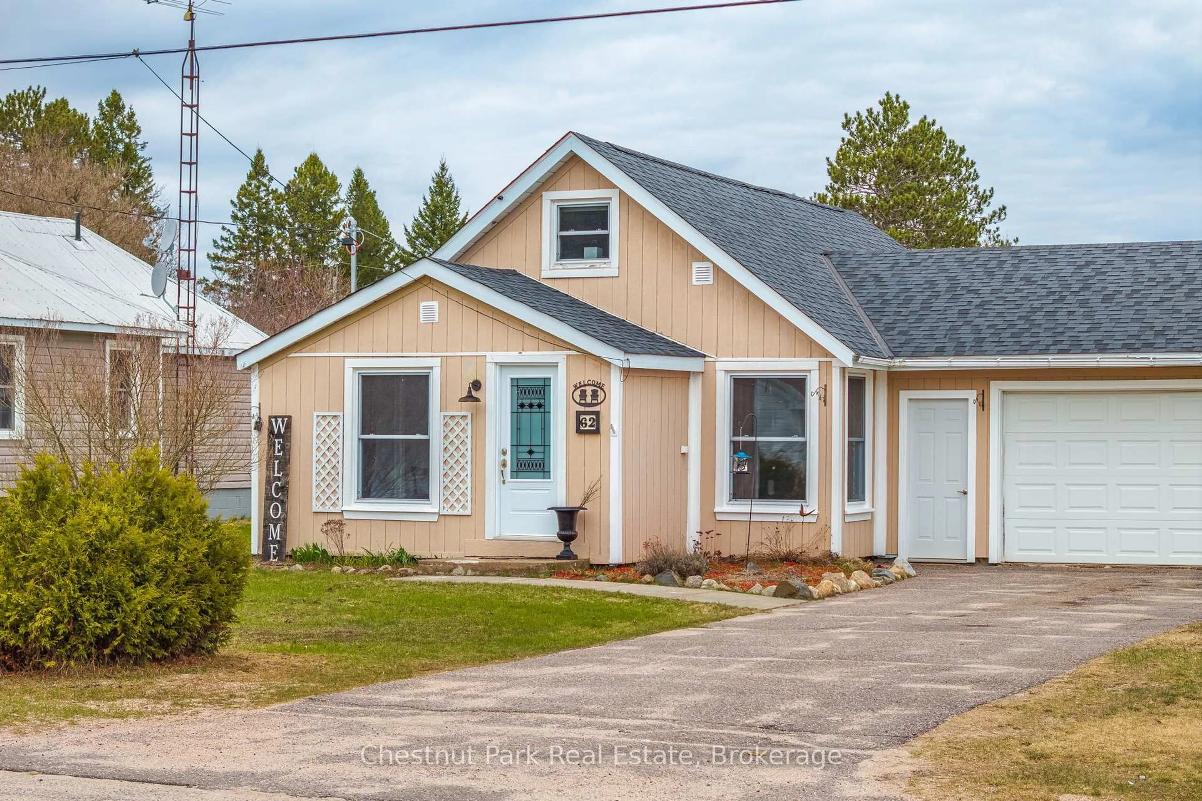 Home with vinyl exterior material, street for 62 Riverside Ave, South River Ontario P0A 1X0